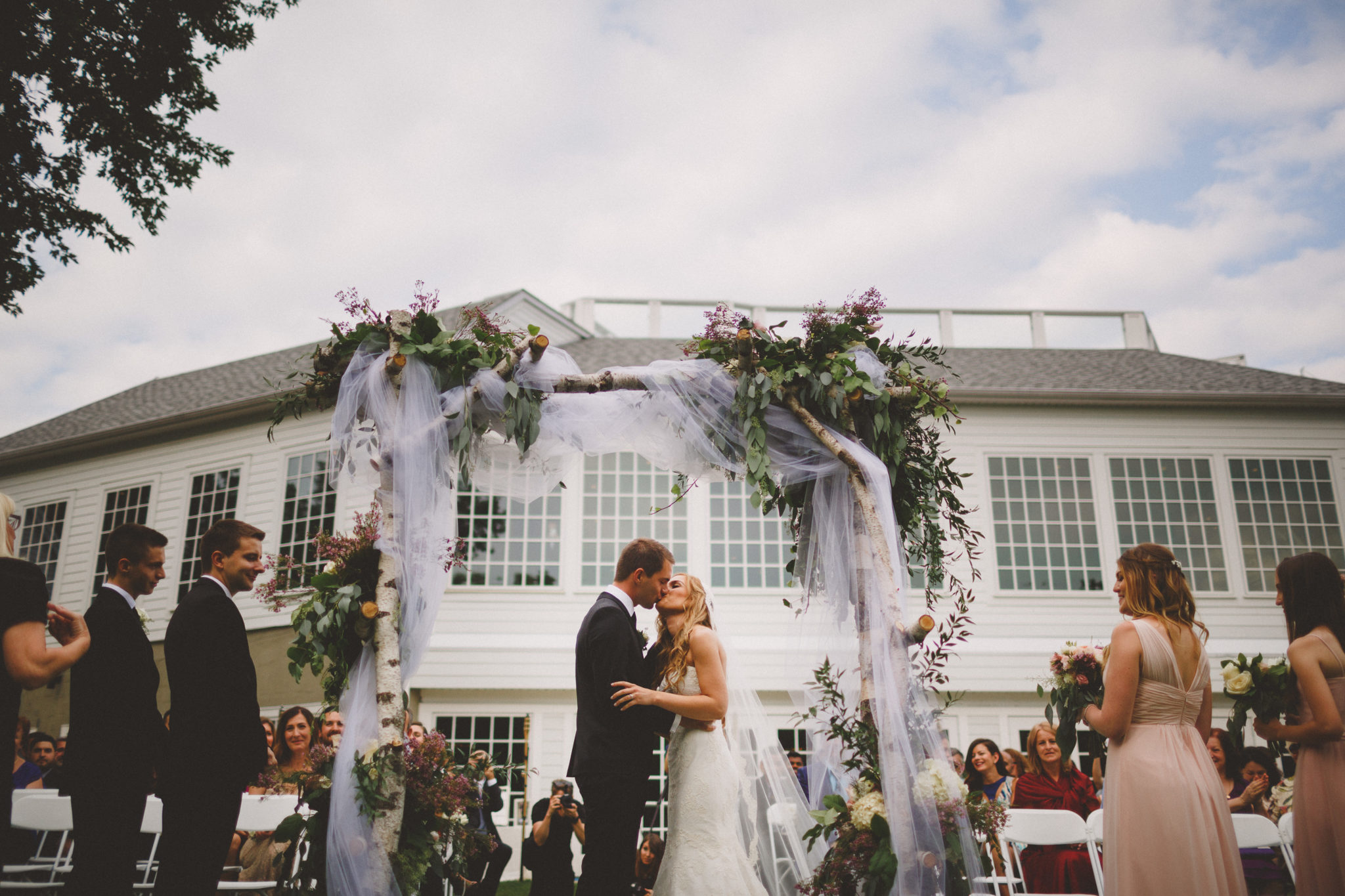 wedding-first-kiss-ceremony-face-audience-guests