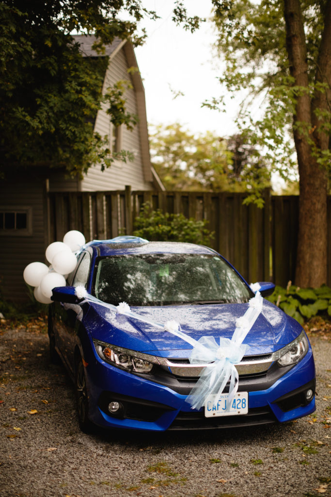 blue honda car decoratedf or wedding