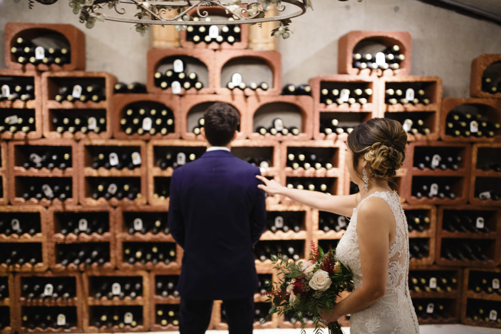 wedding vineland estates winery cellar bride groom first look