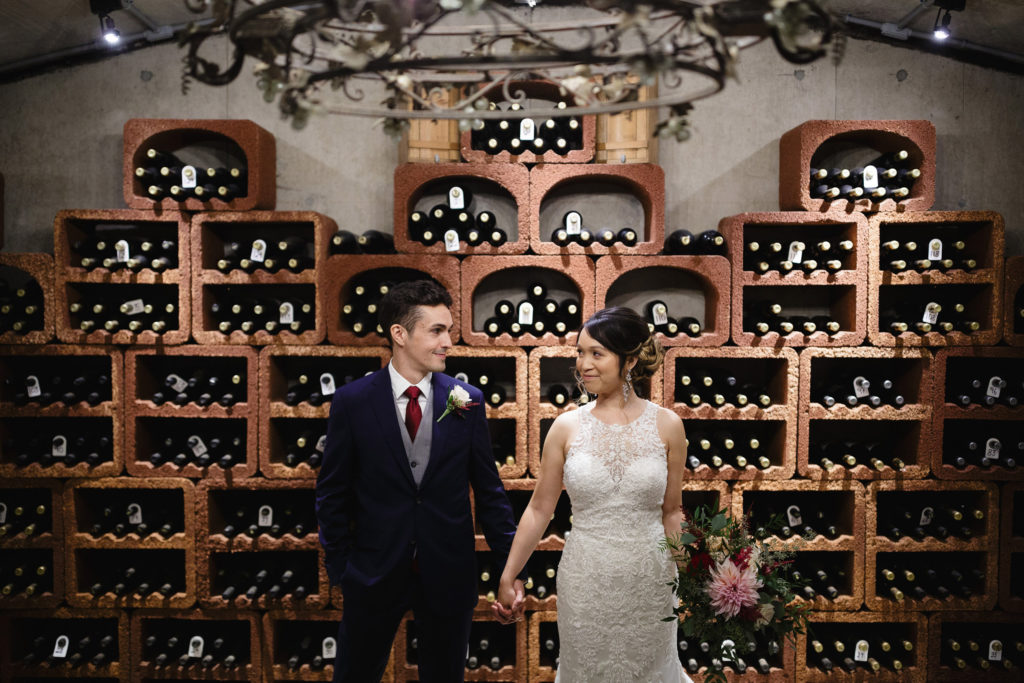 bride groom portrait vineland estates winery cellar barrel room