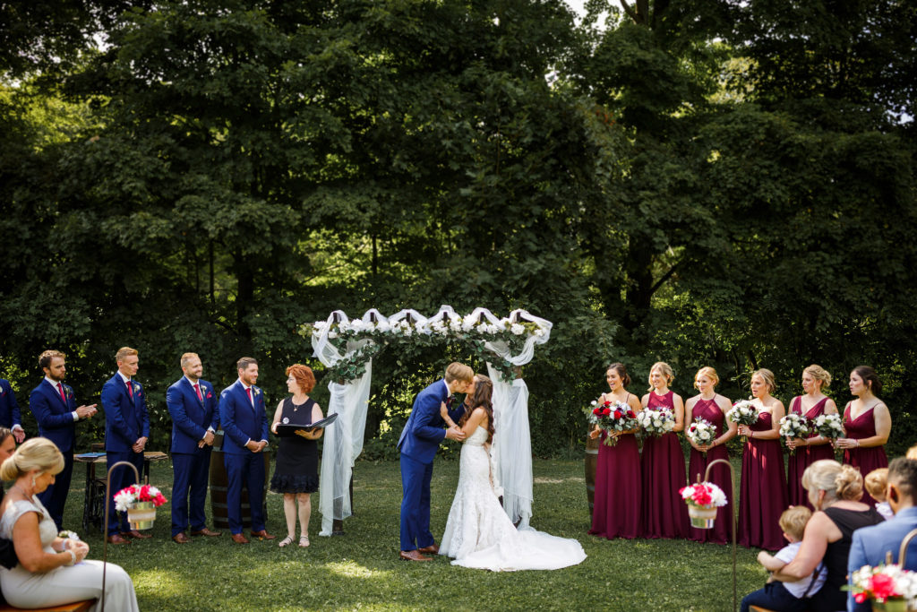 first kiss outdoor ceremony balls falls lincoln wedding photographer brooker events