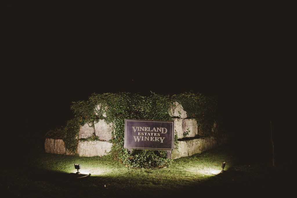vineland estates winery entrance sign night niagara wedding photographer