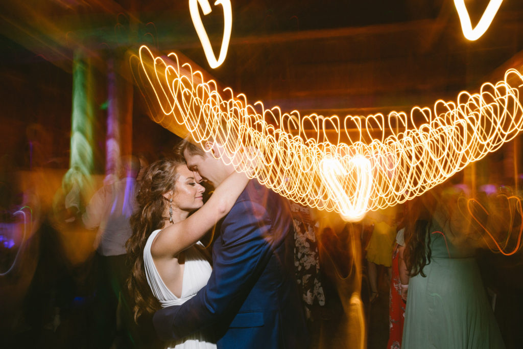 wedding reception dancing photography long exposure creative balls falls barn wedding