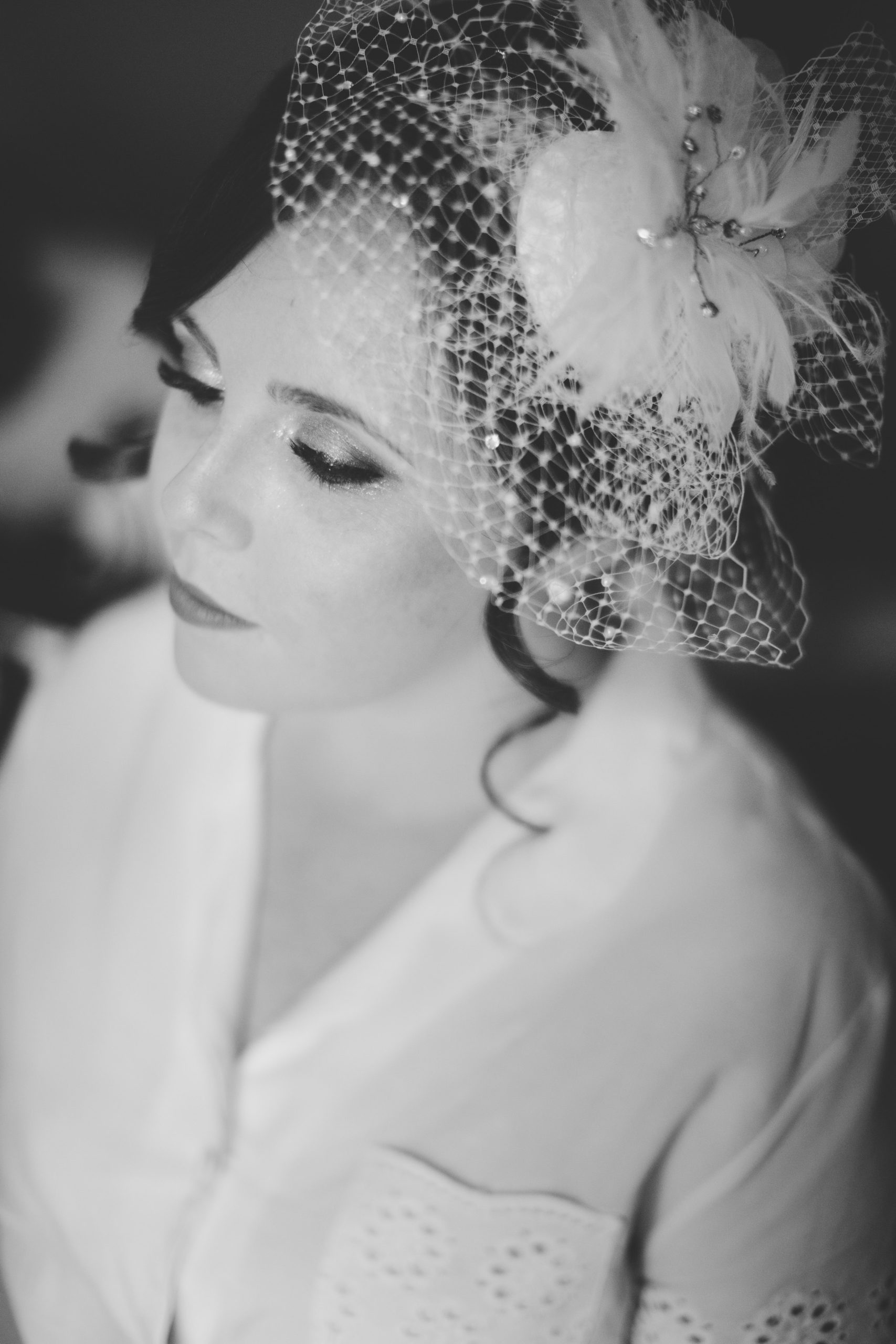 black white wedding photography bride fascinator