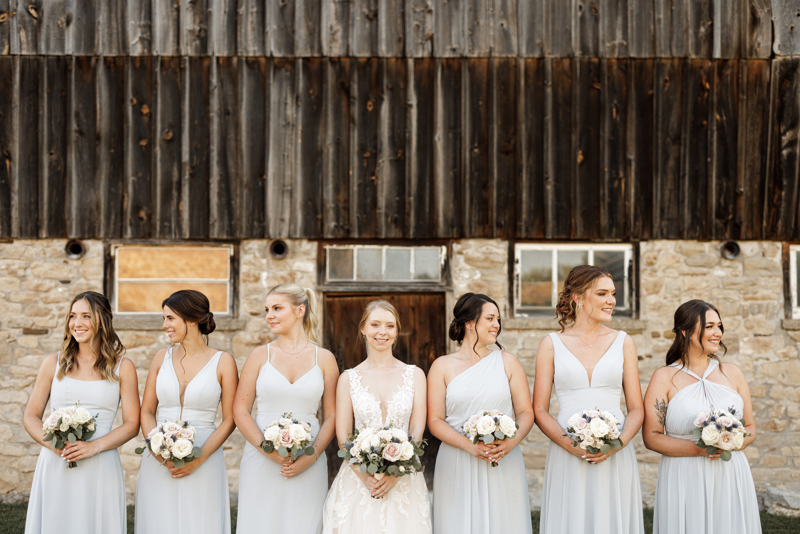 wedding party bridal group photo barn cave spring vineyard summer afterglow