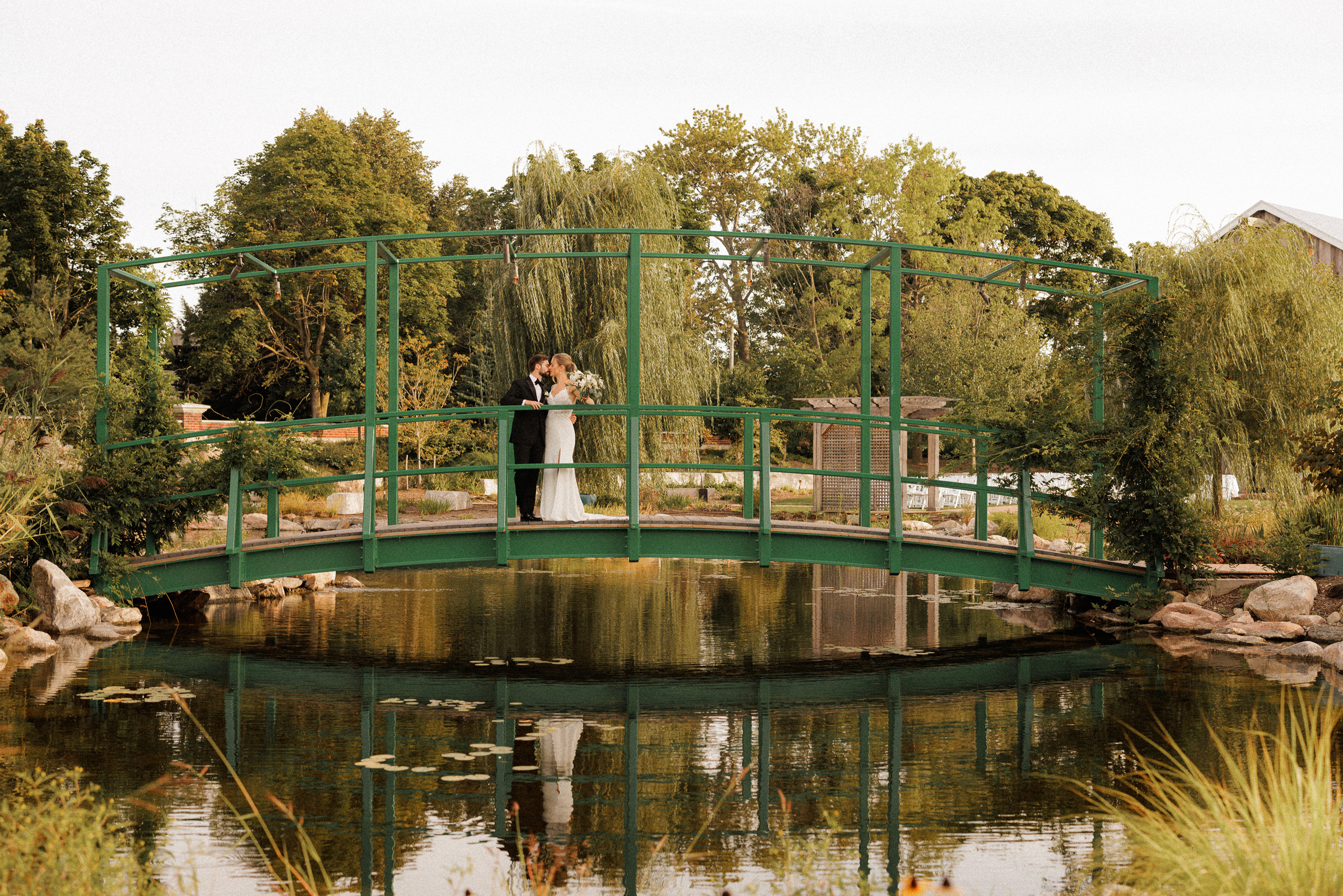 bride groom bridge gardens Pont de Monet pillar and post NOTL wedding