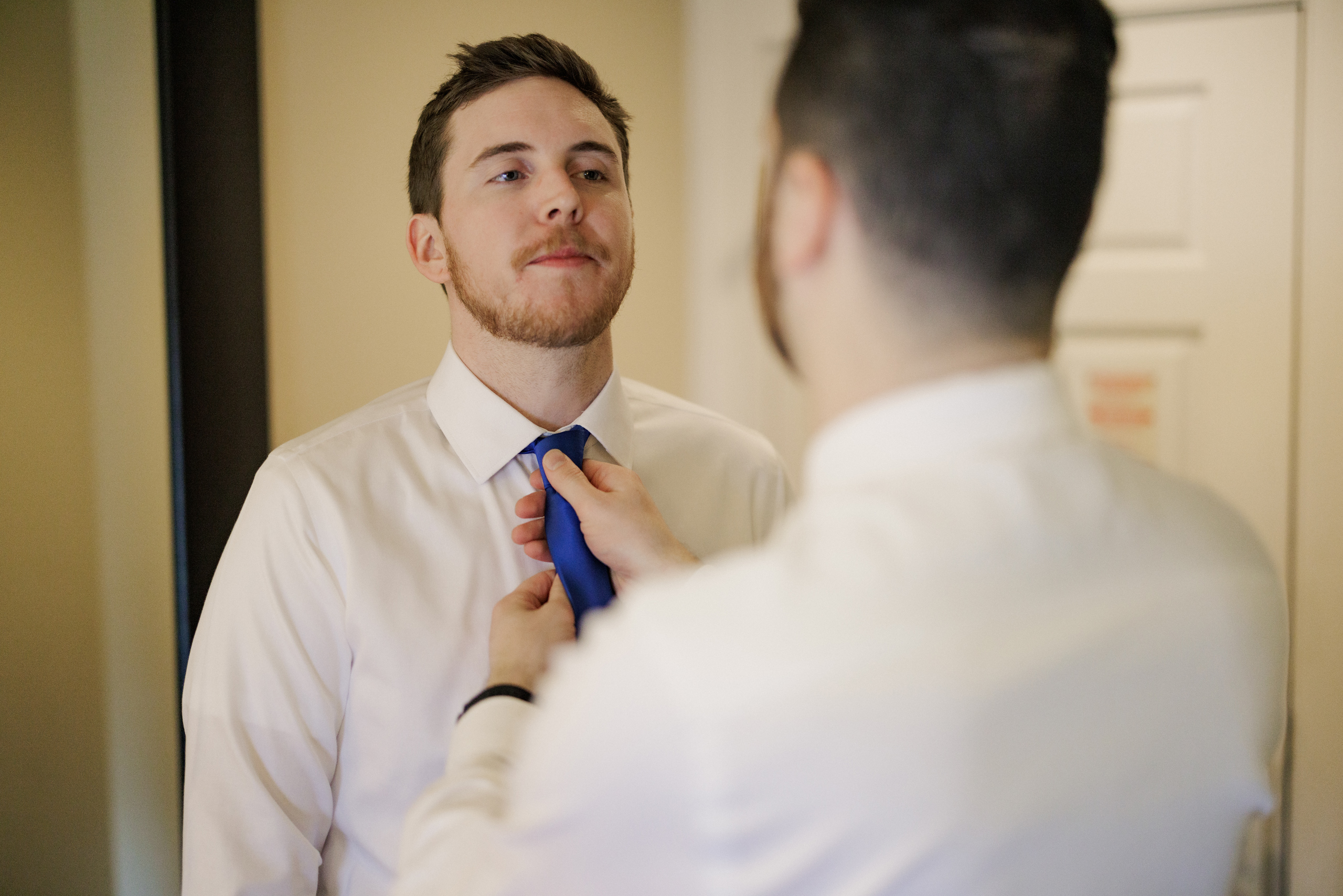 groom getting ready oban inn wedding niagara on the lake