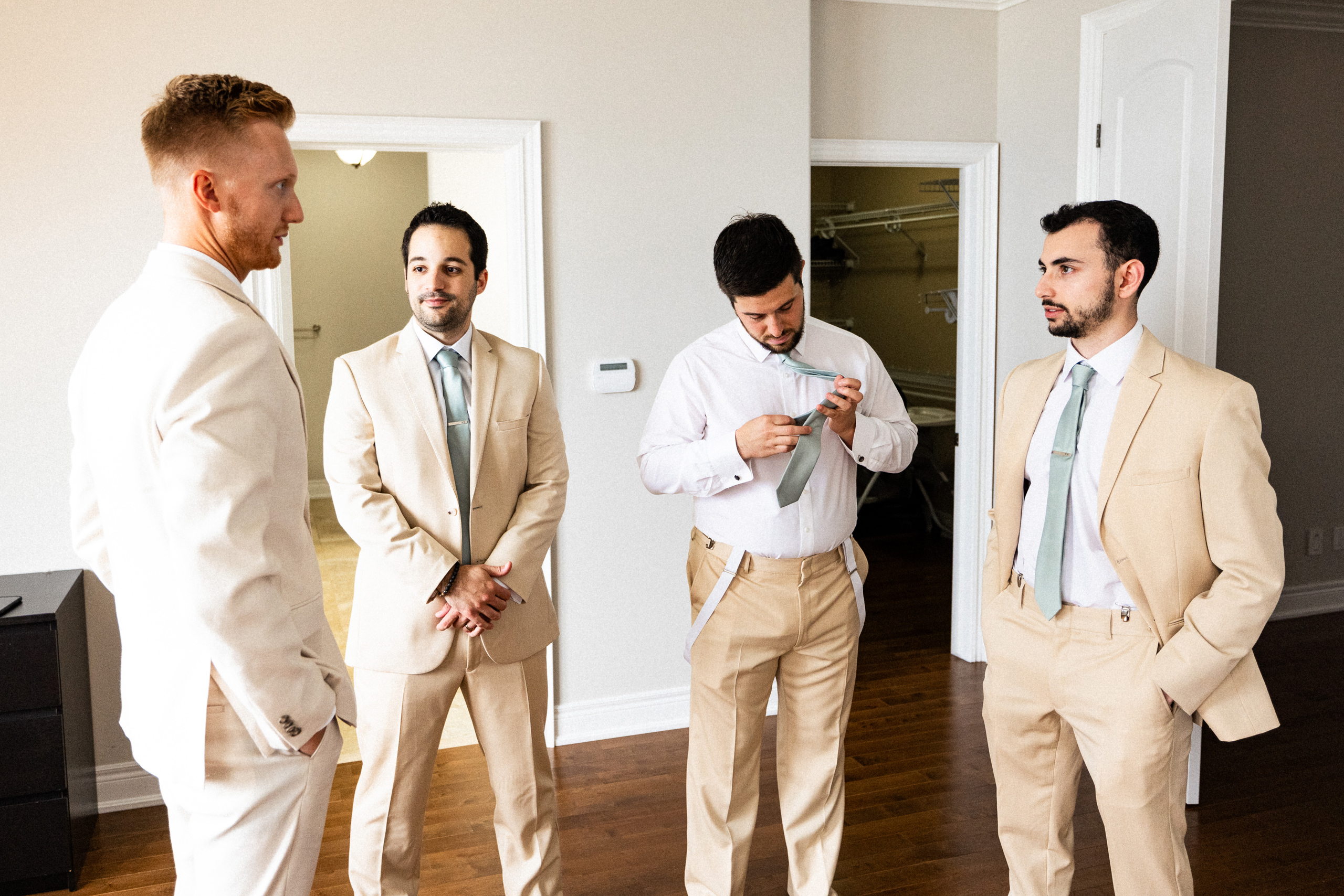 groomsmen prep tan suit niagara wedding