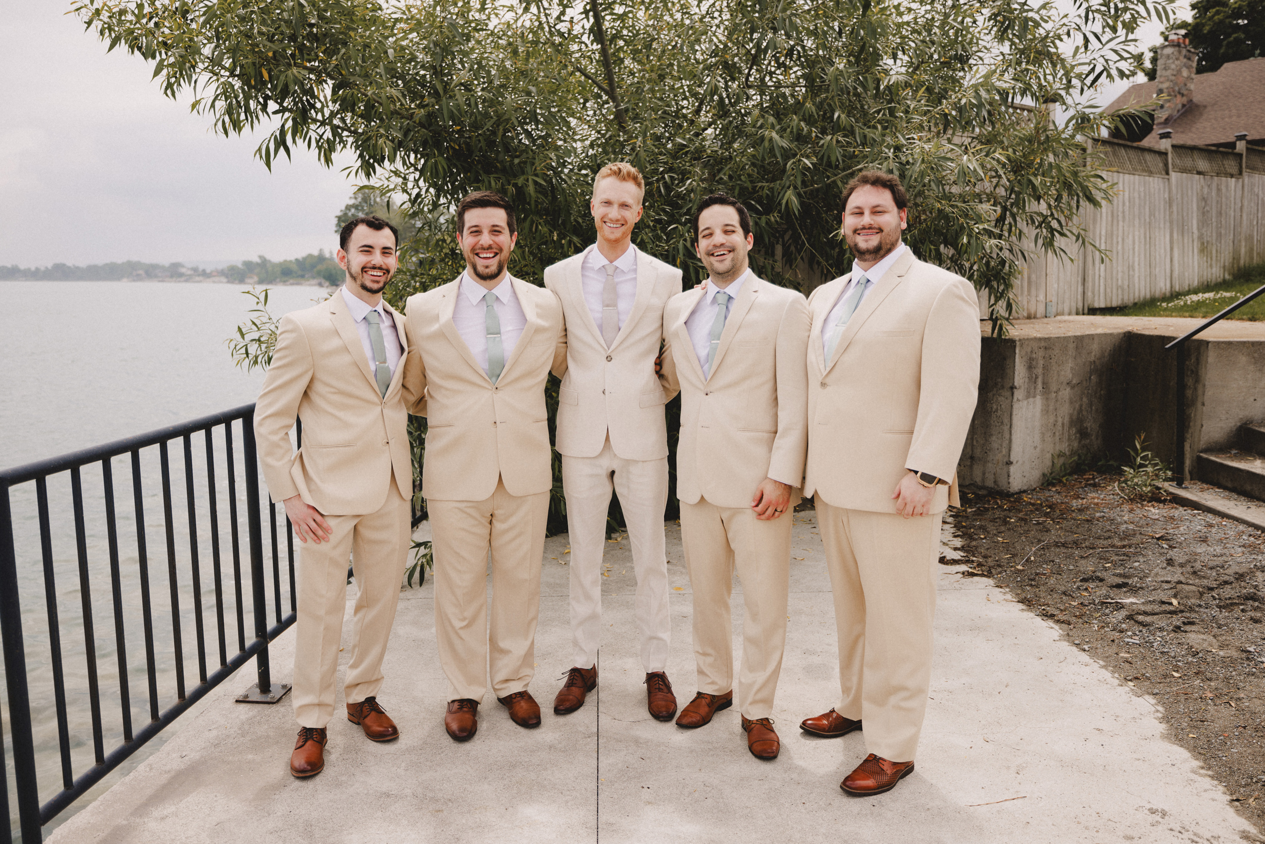 groomsmen prep tan suit niagara wedding