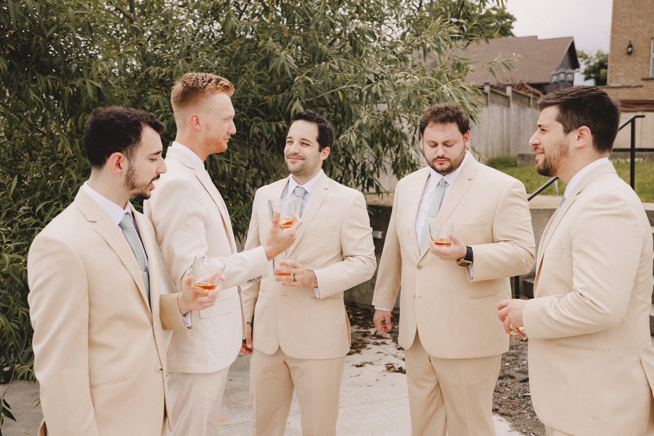 groomsmen prep tan suit niagara wedding