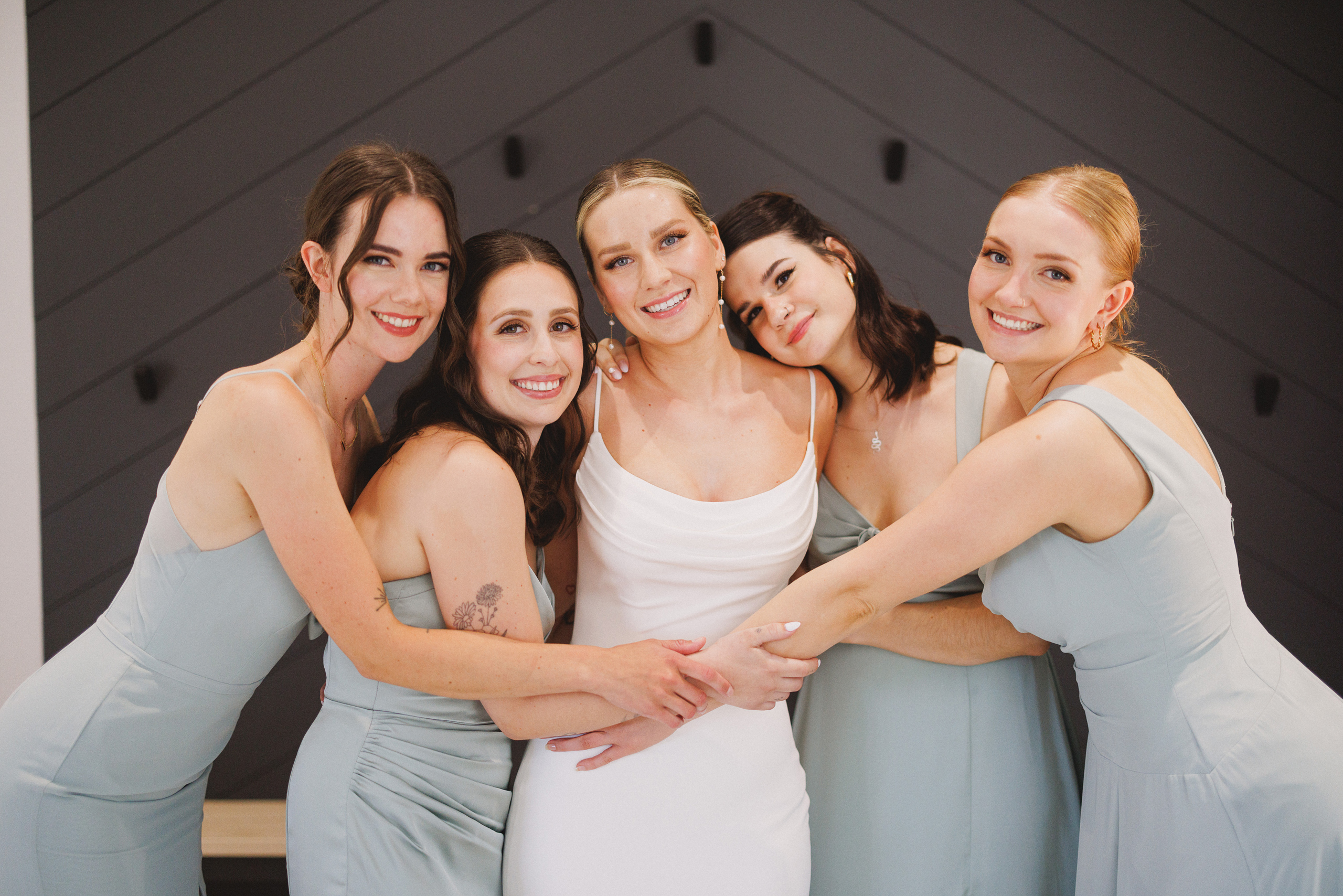 group hug before leaving for the ceremony