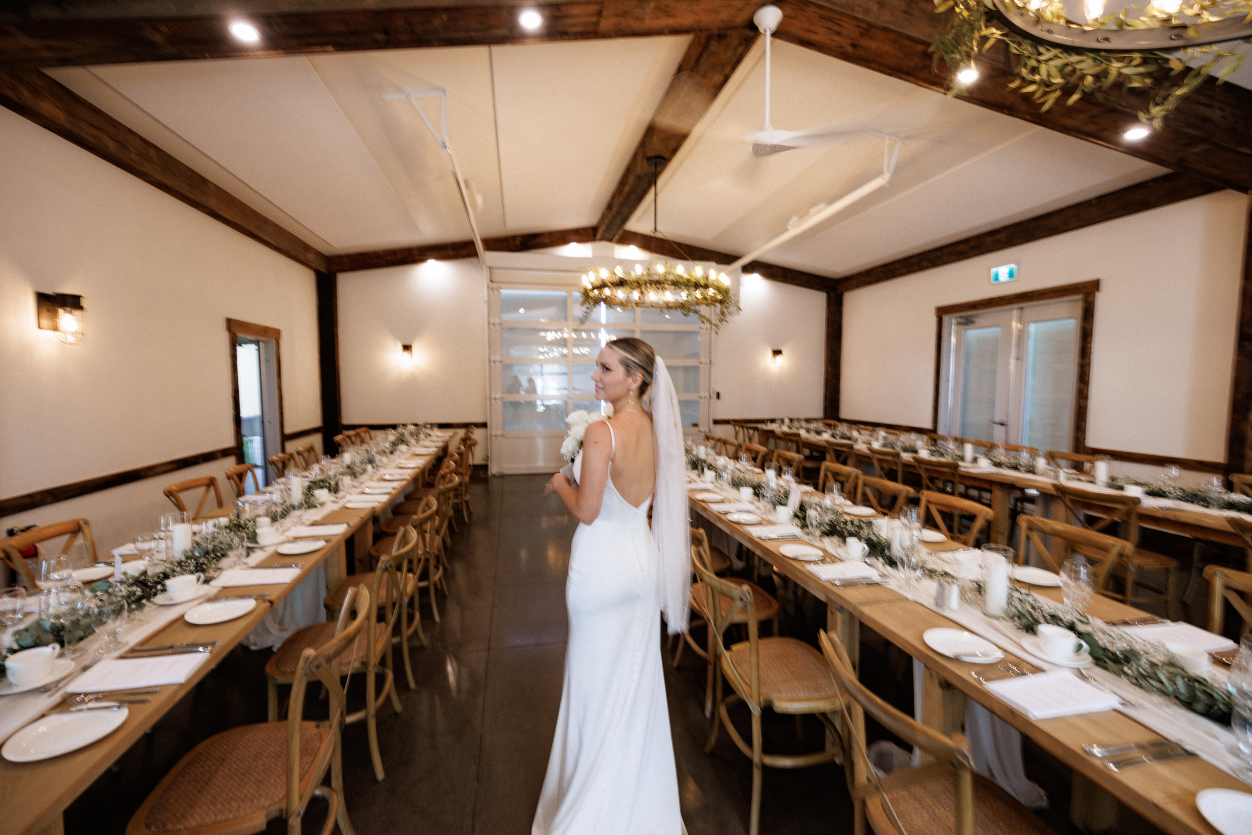 bride sees reception area cave spring vineyard summer wedding