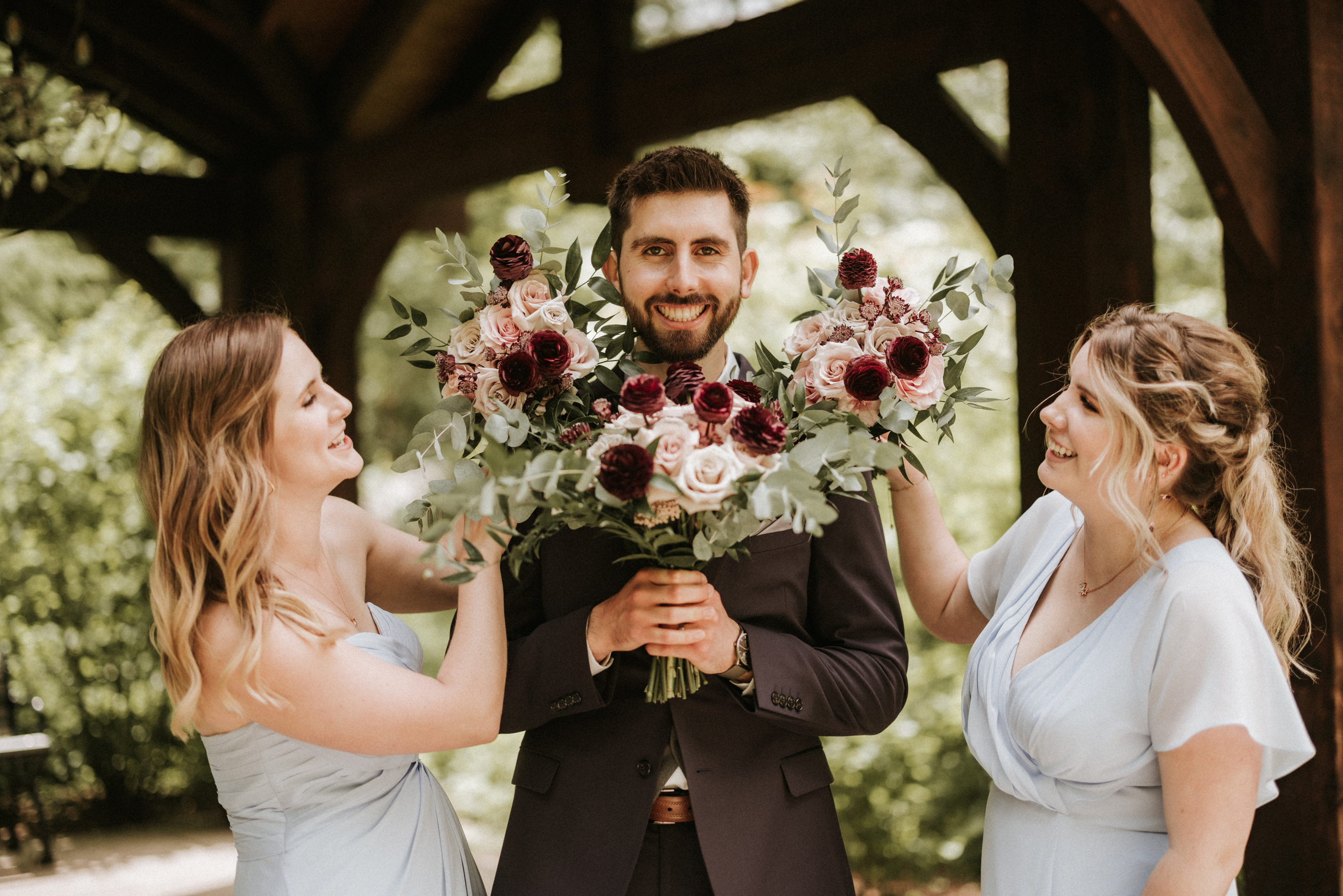 groom with flowers bouquets ancaster mill