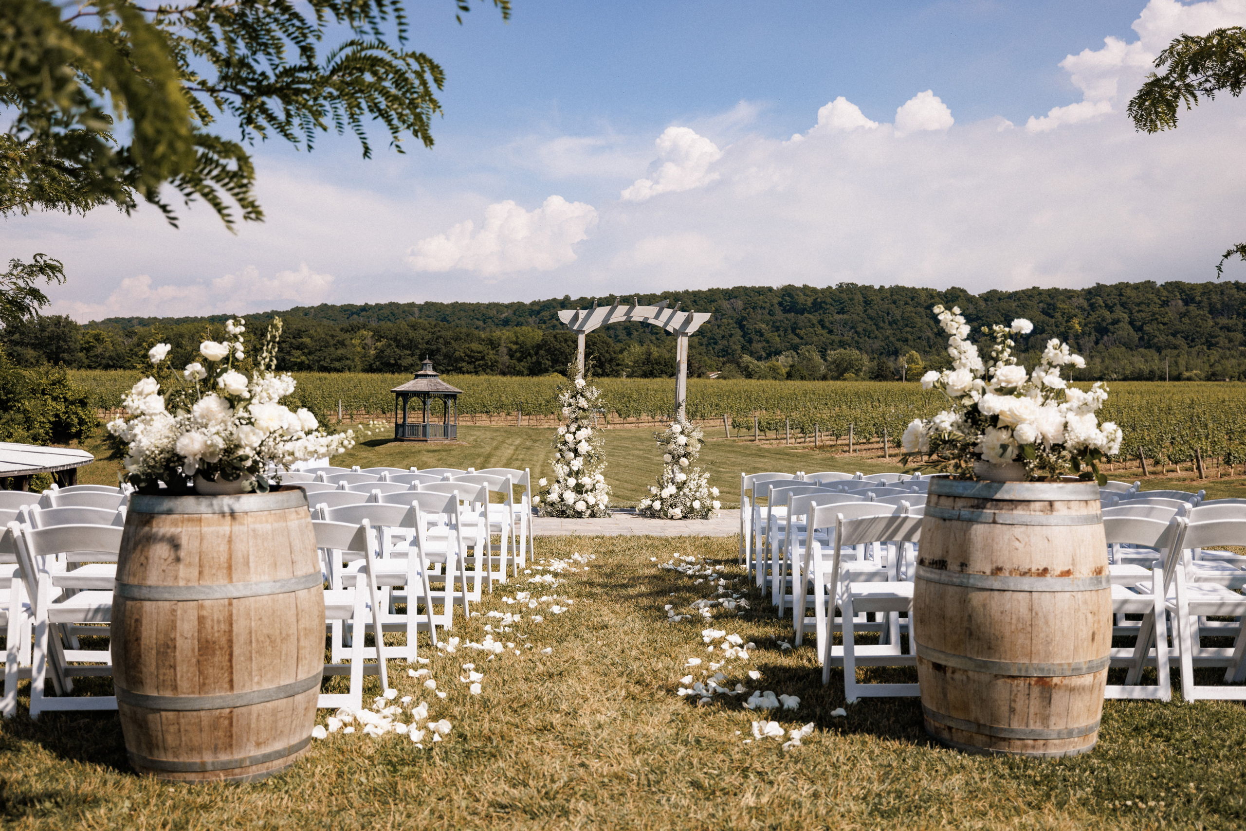 outdoor ceremony summer cave spring vineyard wedding afterglow