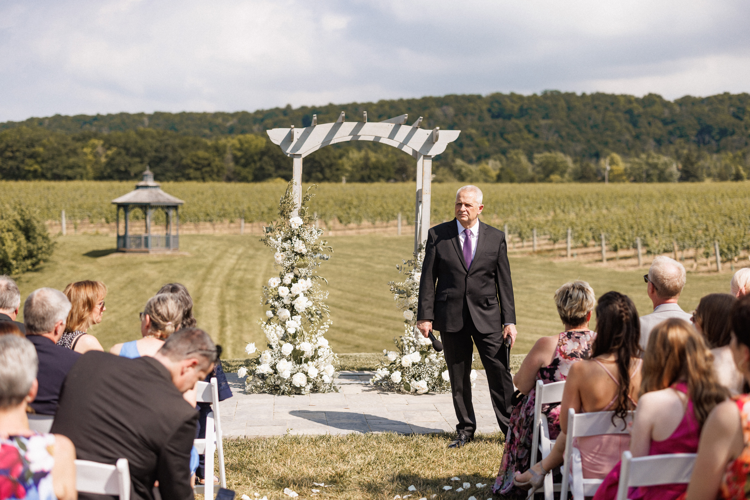 outdoor ceremony summer cave spring vineyard wedding afterglow