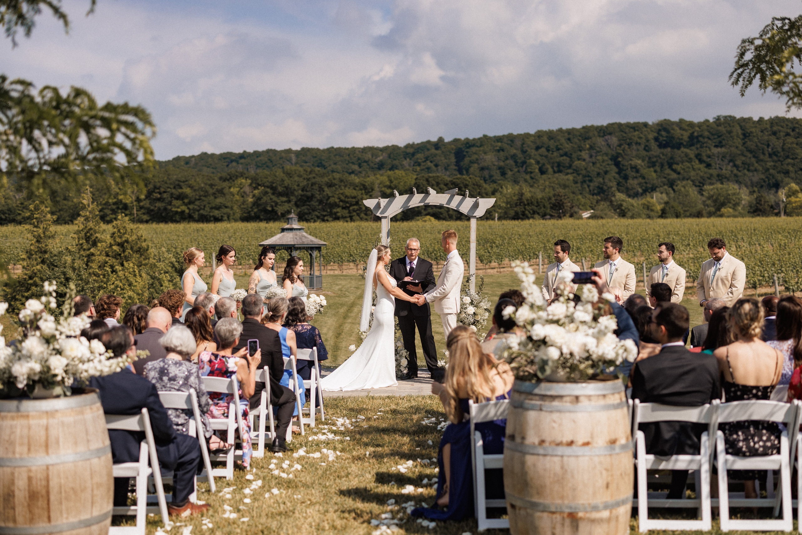 outdoor ceremony summer cave spring vineyard wedding afterglow