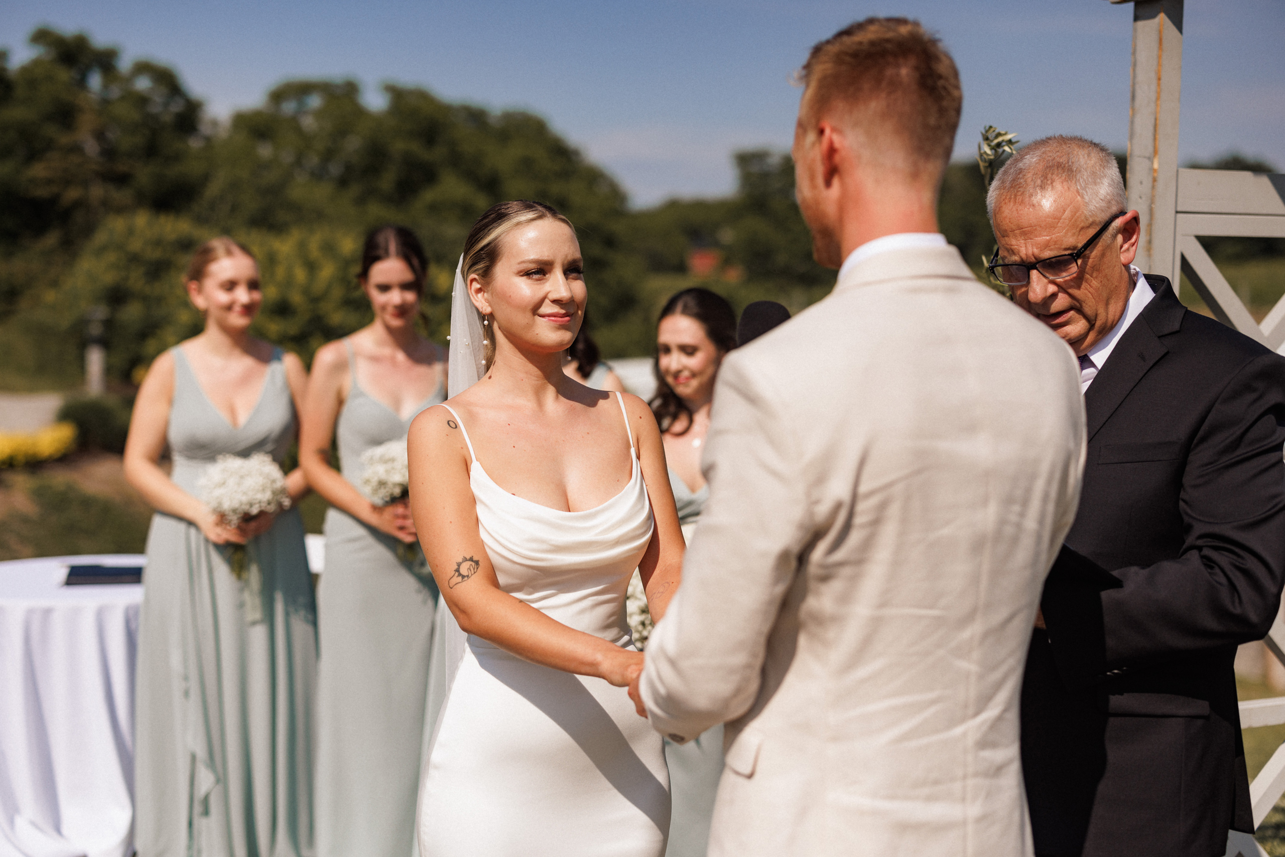 outdoor ceremony summer cave spring vineyard wedding afterglow