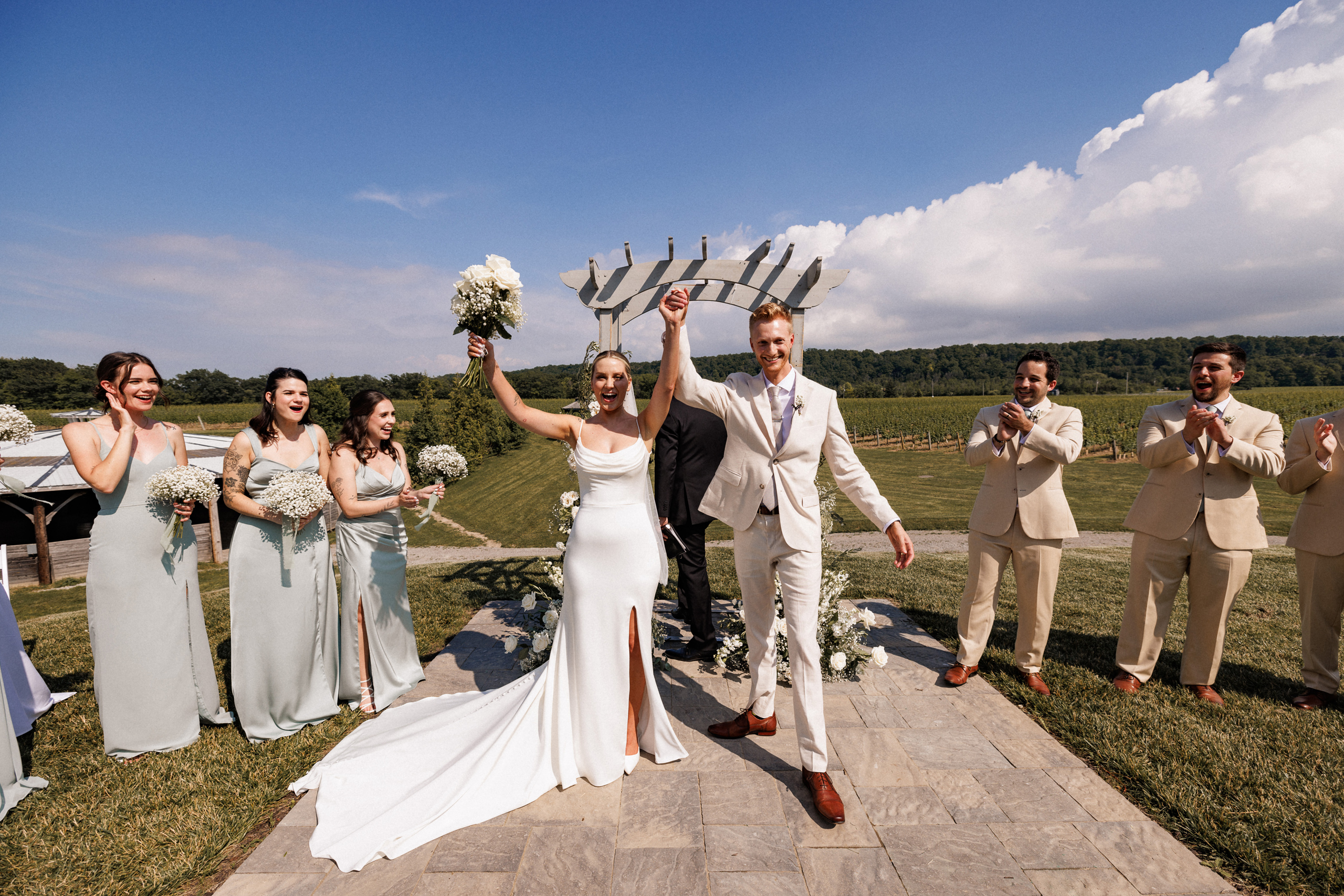 outdoor wedding ceremony cave spring vineyard summer