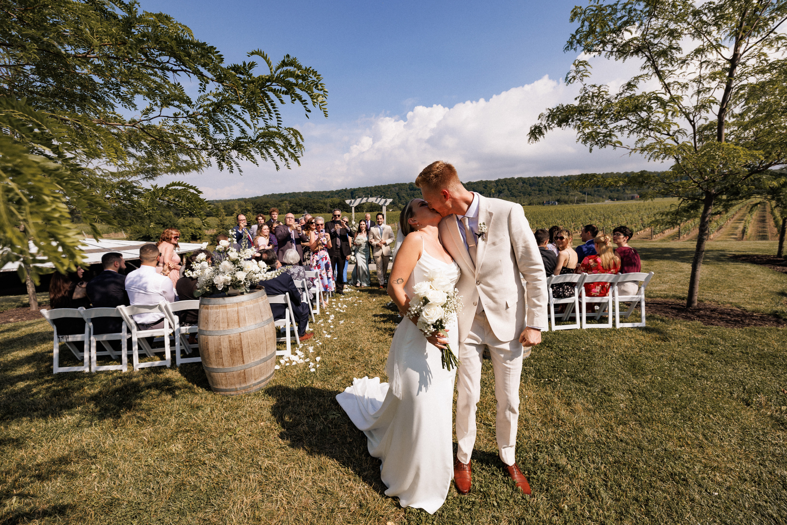 outdoor wedding ceremony cave spring vineyard summer