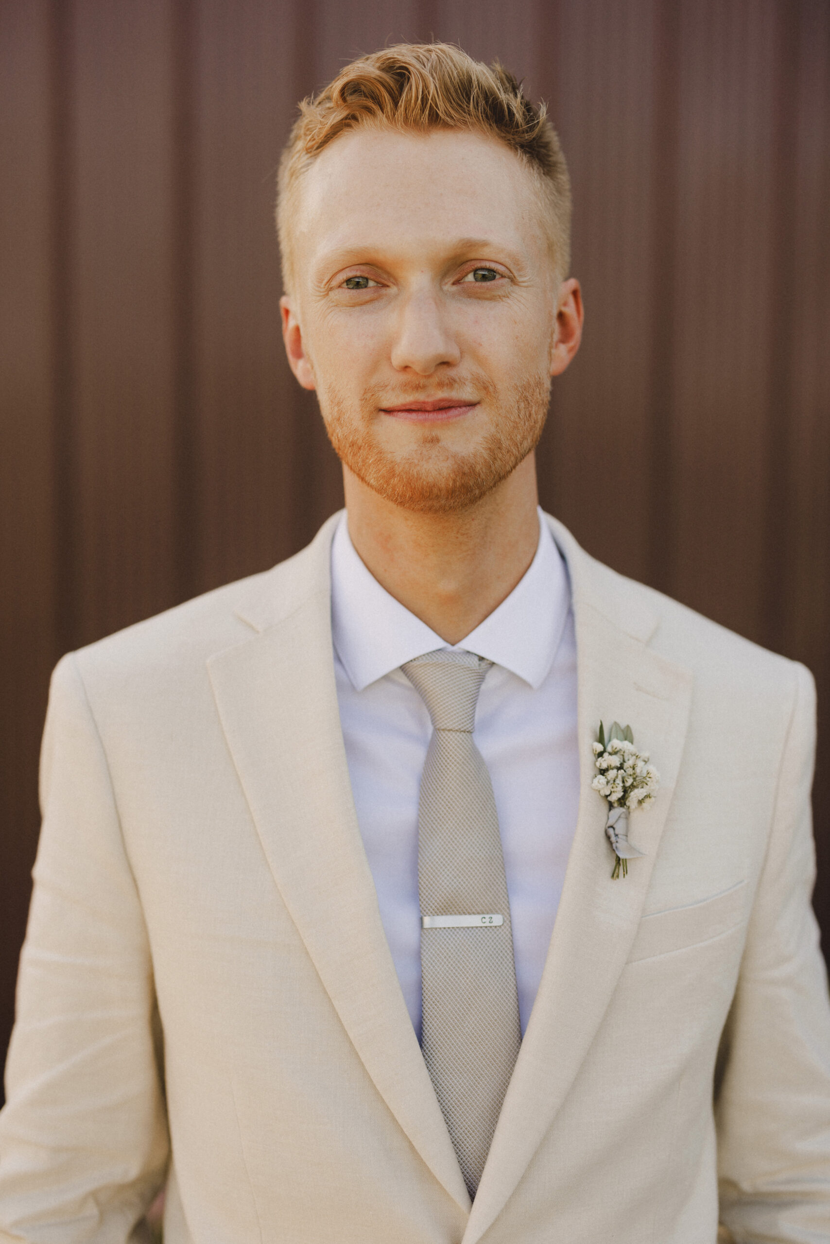 groom portrait summer wedding