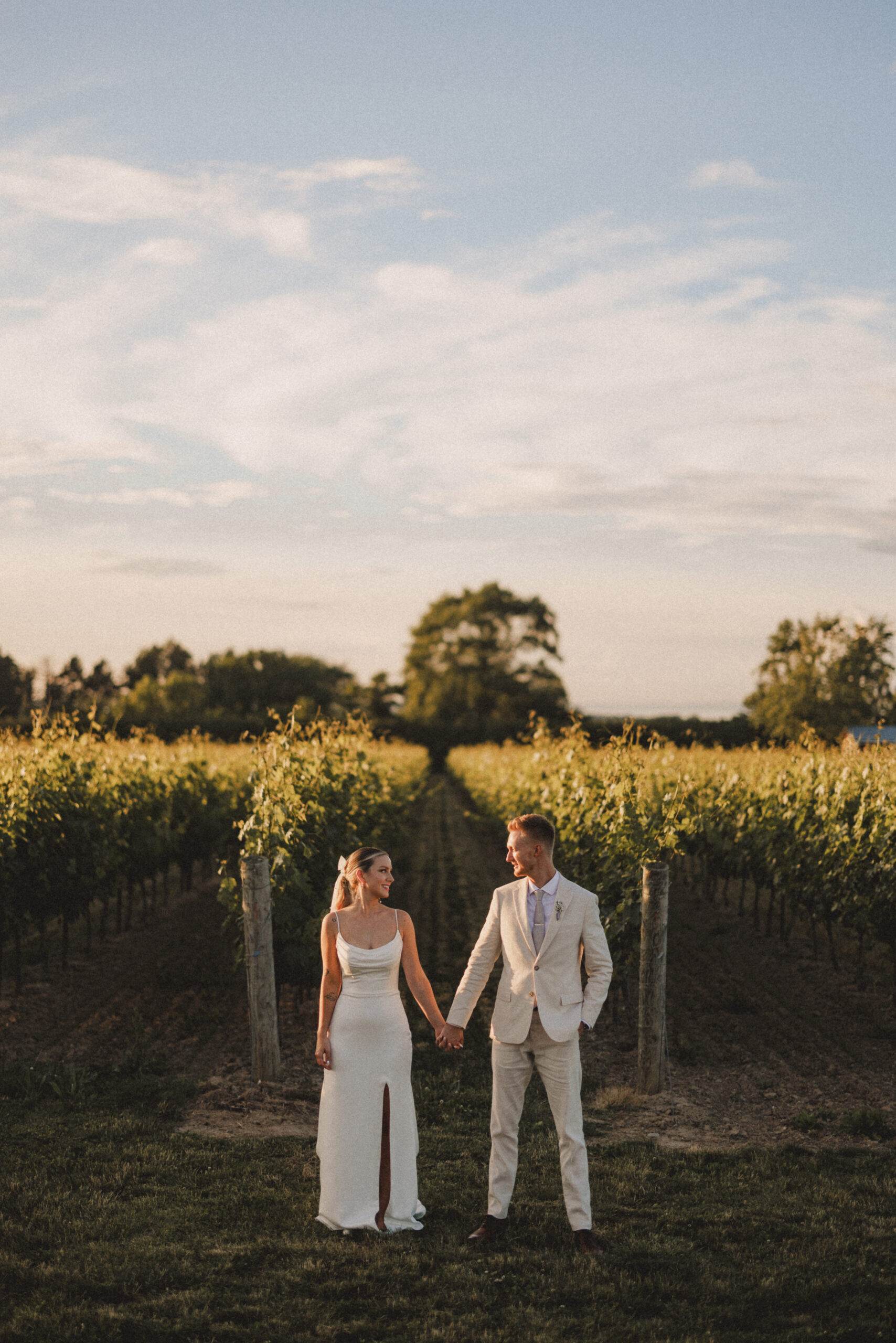 sunset photos bride groom cave spring vineyard summer wedding