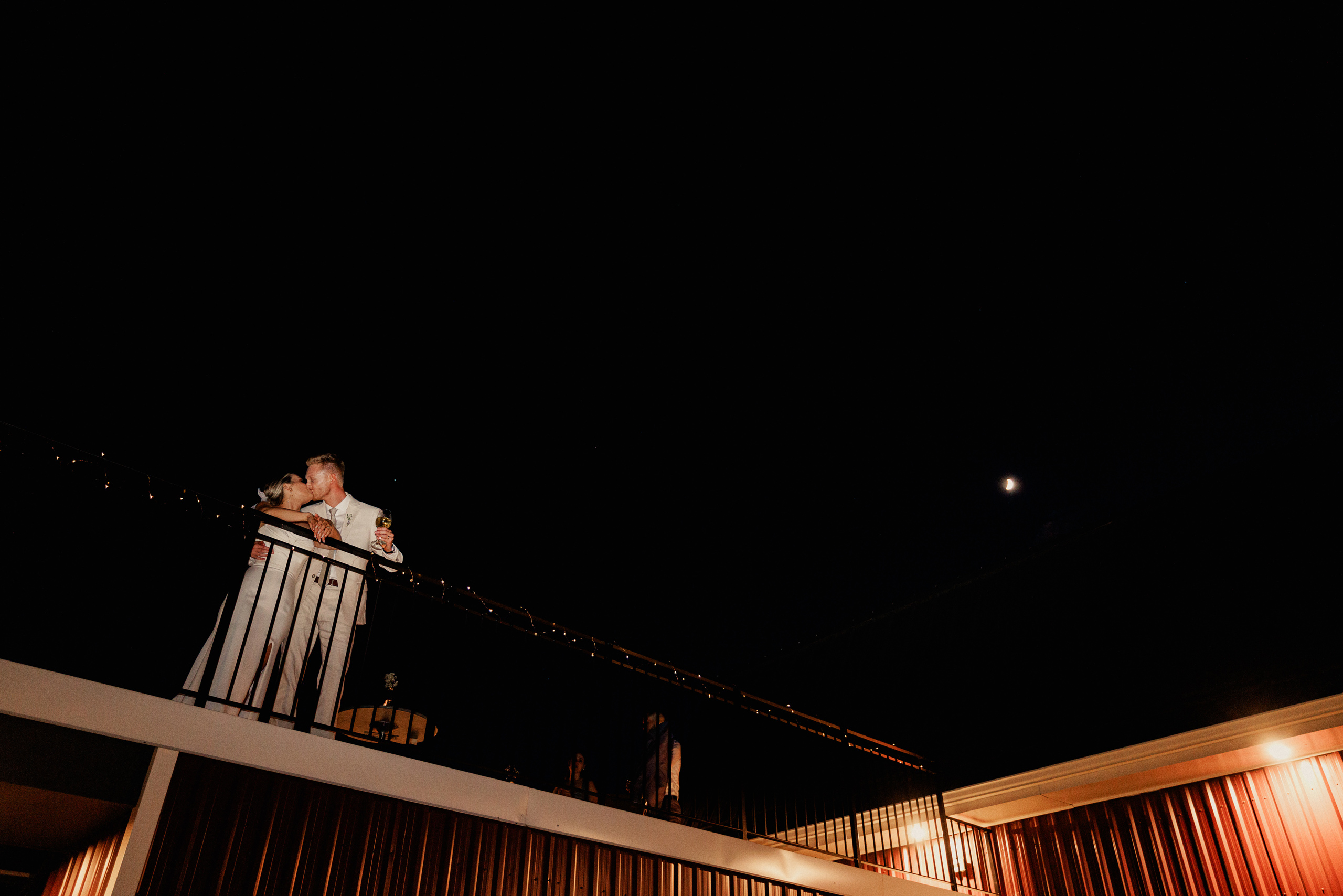 bright groom night photos under moon cave spring vineyard weddin