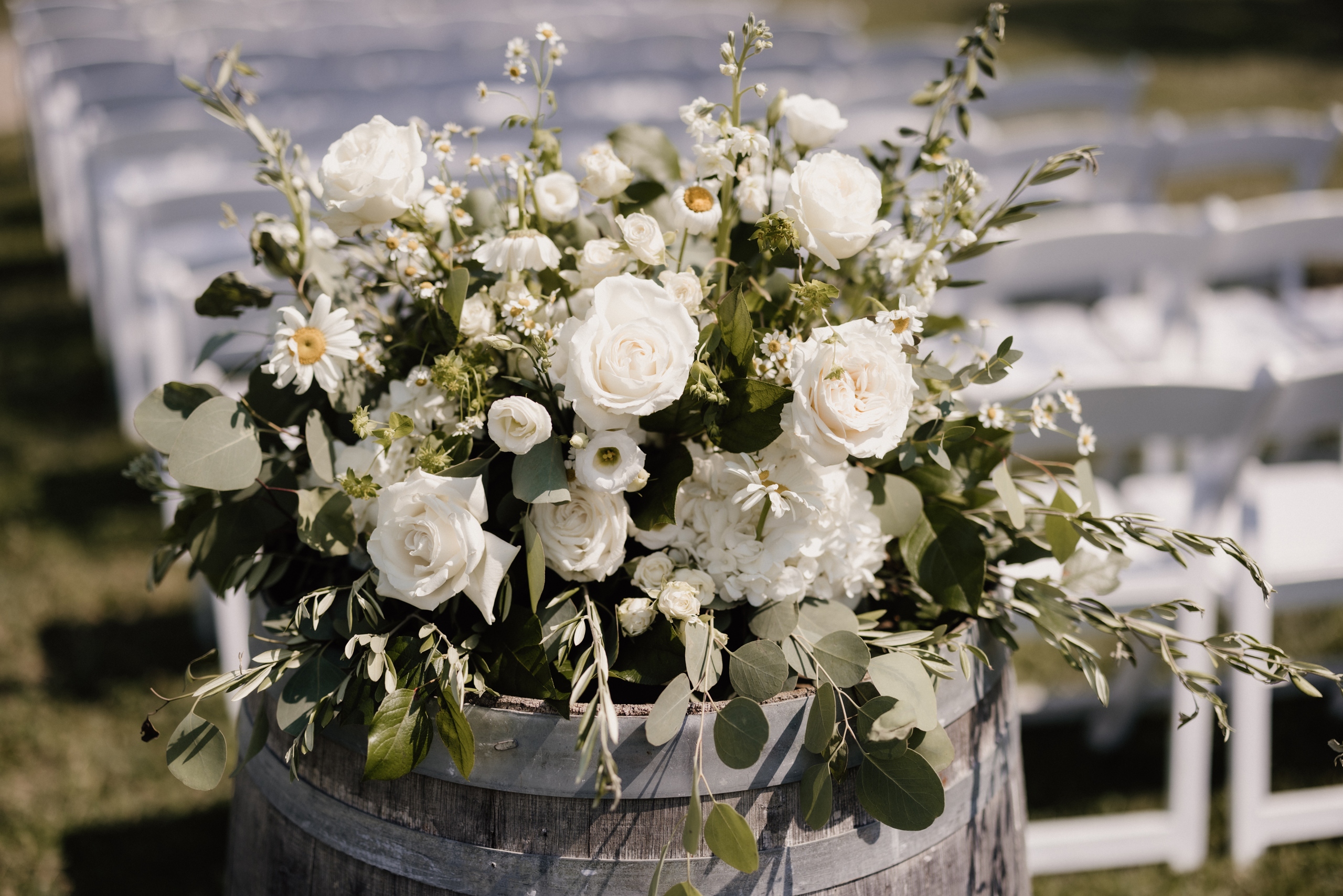 outdoor ceremony site barns at cave spring vineyard florals