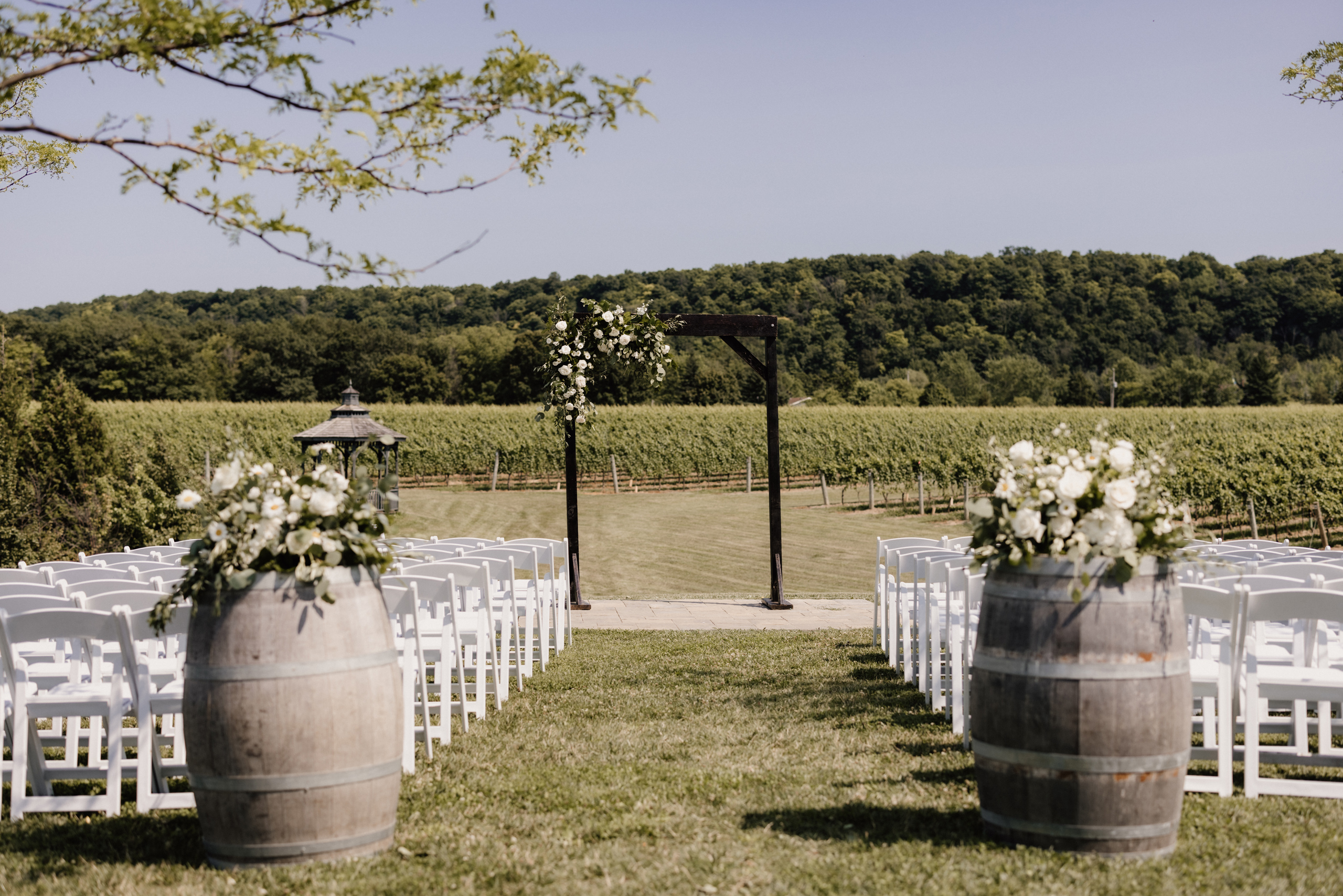 outdoor ceremony site barns at cave spring vineyard