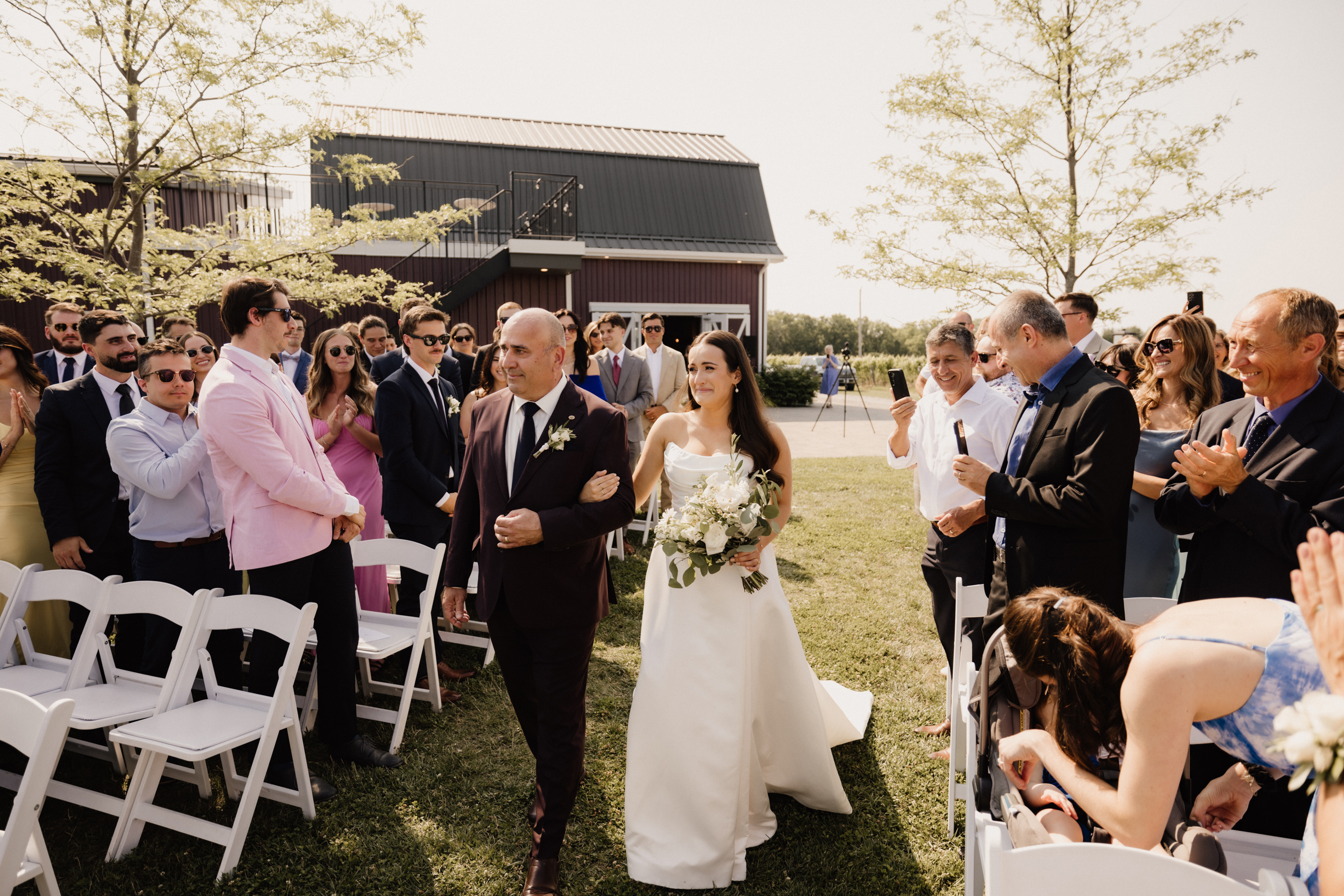 outdoor ceremony site barns at cave spring vineyard summer after