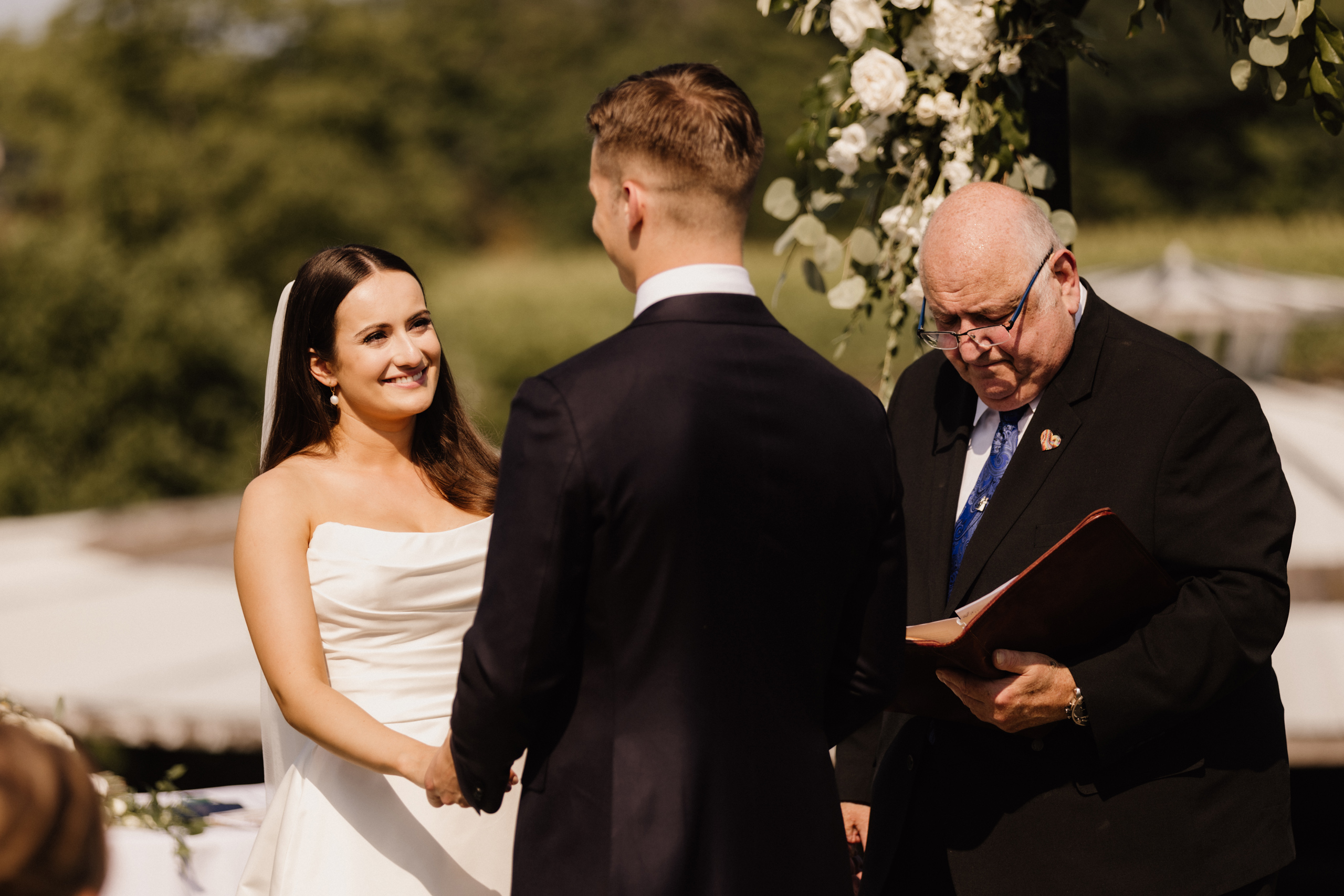 outdoor ceremony site barns at cave spring vineyard summer after