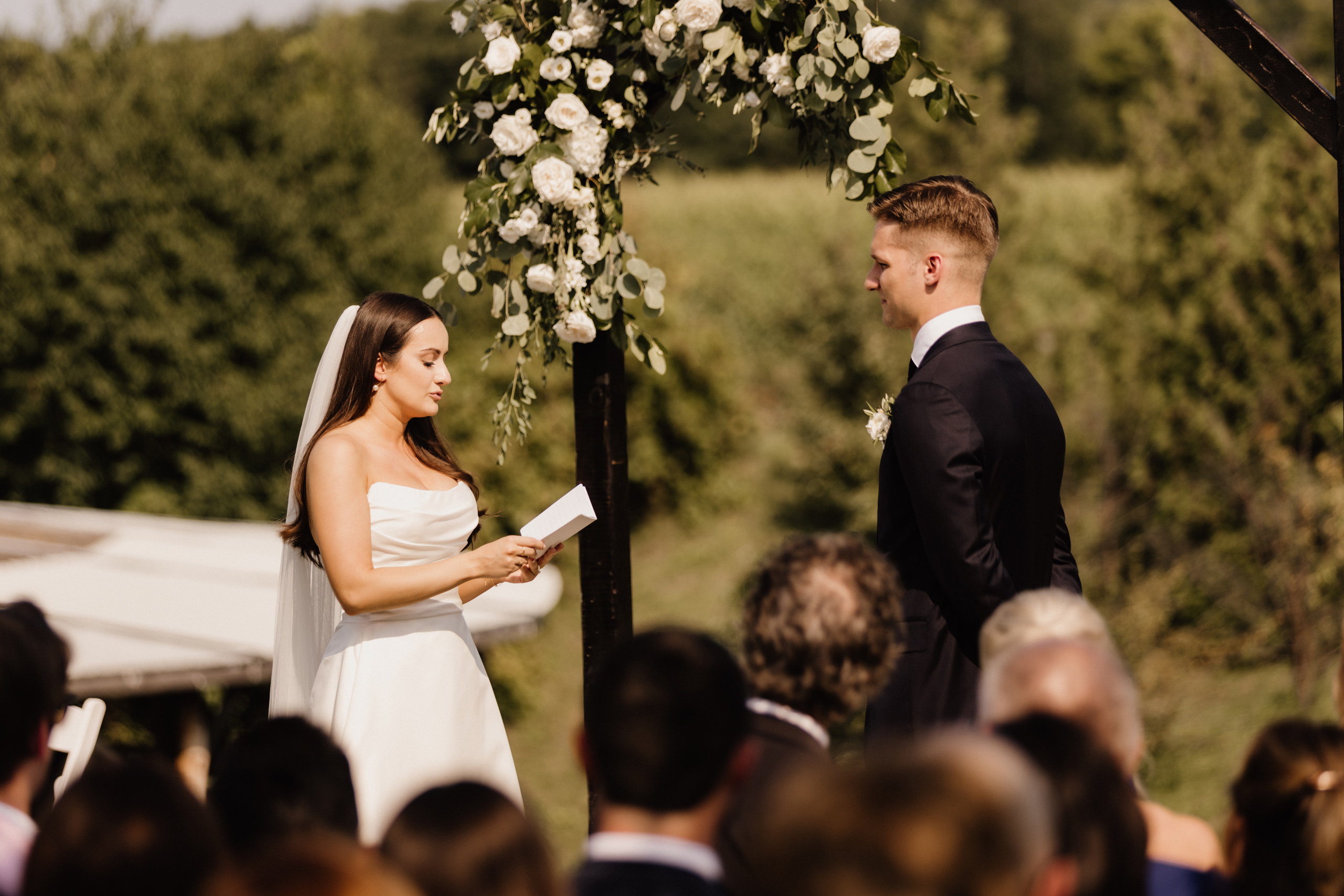 outdoor ceremony site barns at cave spring vineyard summer after