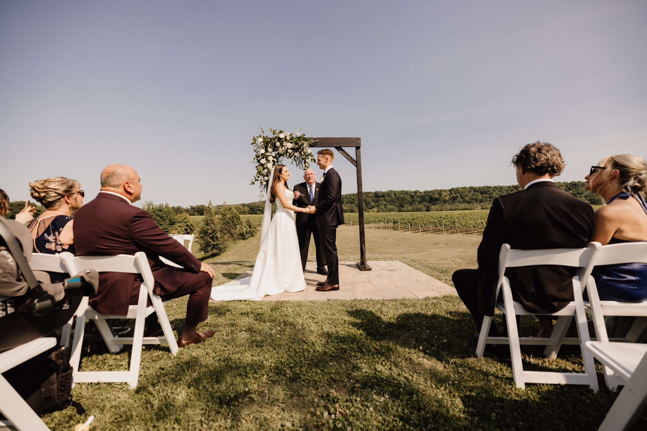 outdoor ceremony site barns at cave spring vineyard summer photo