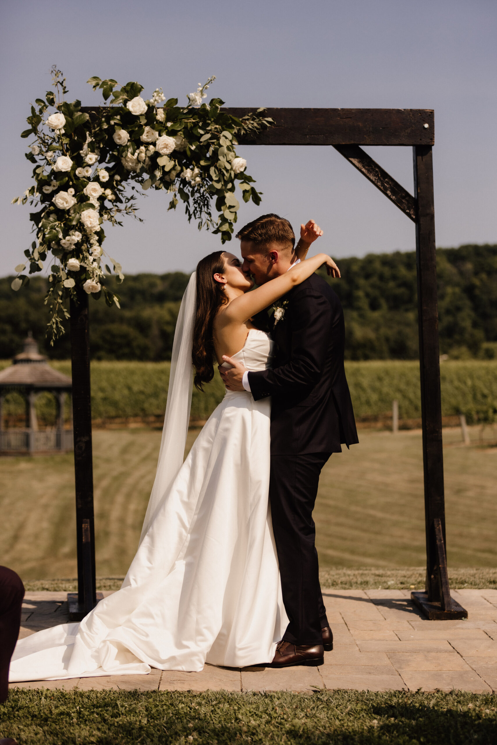 outdoor ceremony site barns at cave spring vineyard summer first