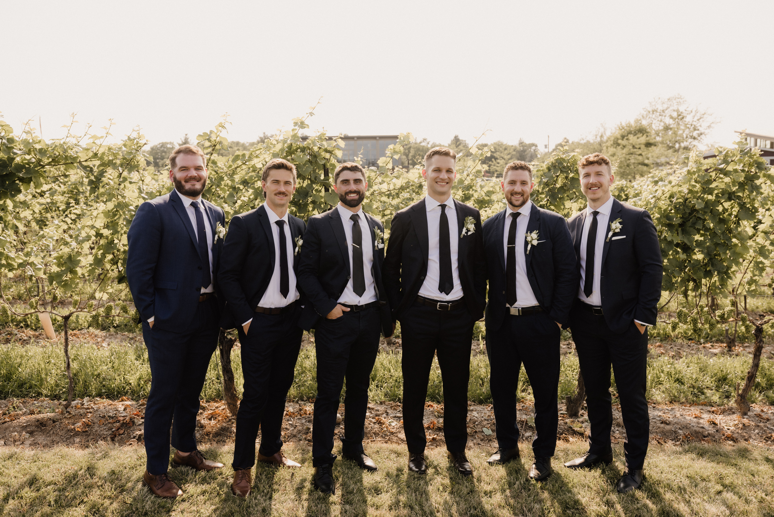 groomsmen wedding at cave spring vineyard summer