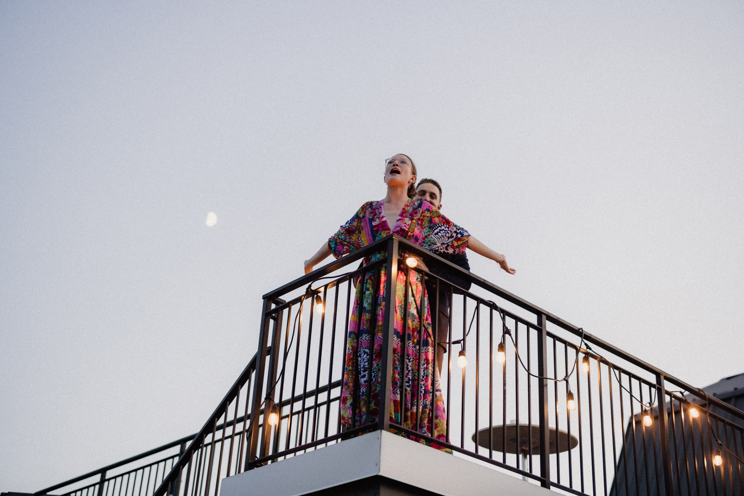 weddings guests having fun on rooftp patio