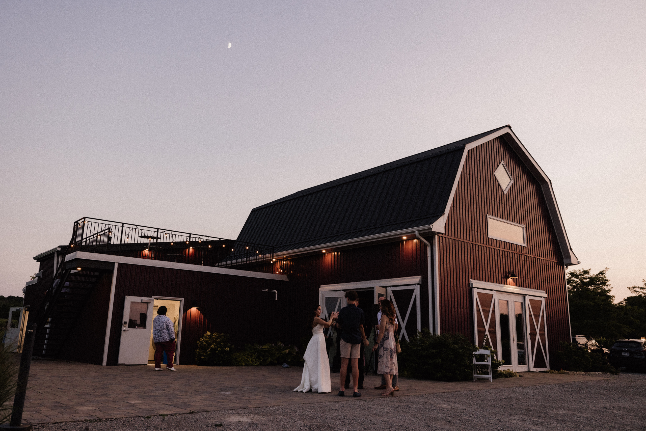 night outside the barns of cave spring vineyard summer wedding
