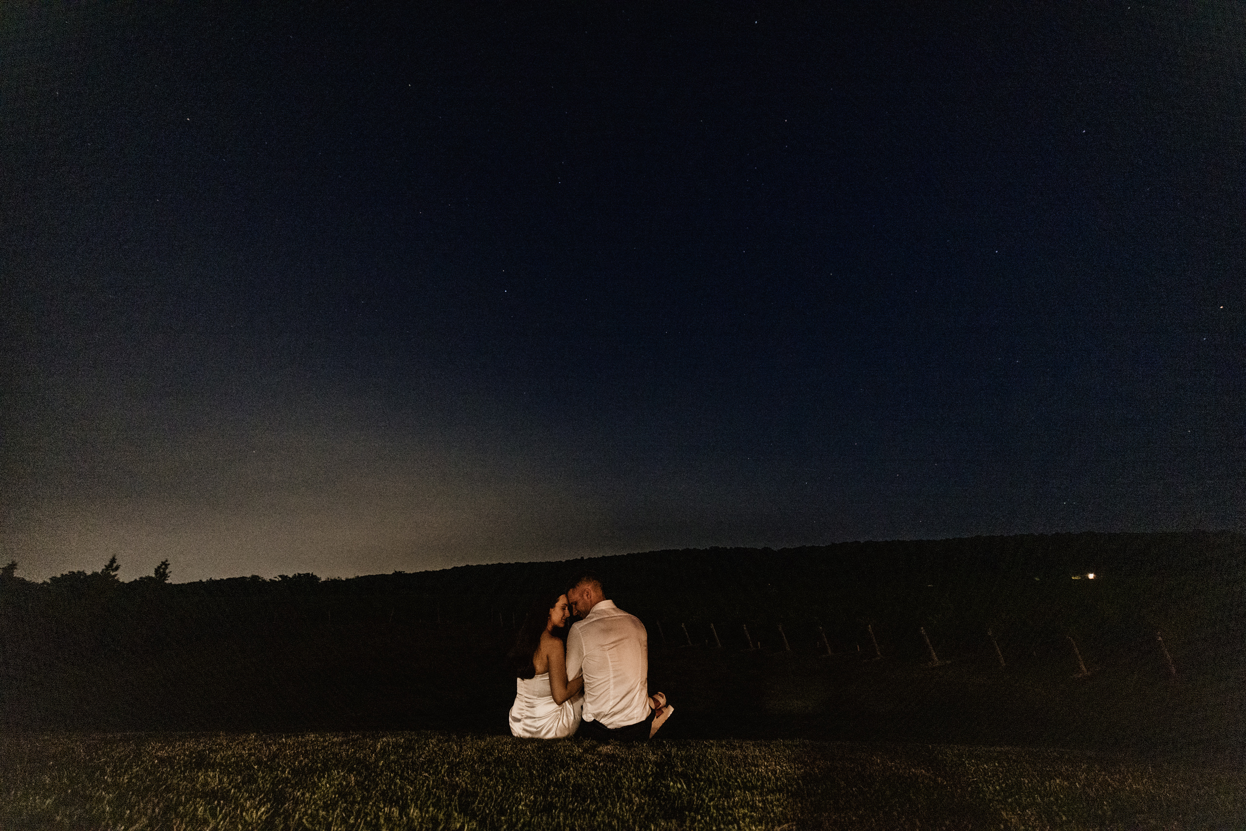 night outside the barns of cave spring vineyard summer wedding