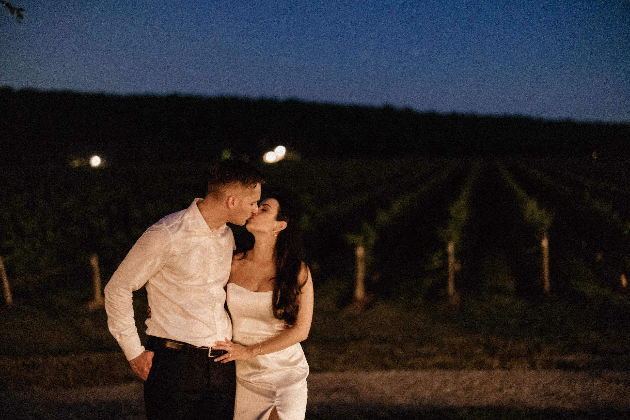 bride groom night portraits barns at cave spring vineyard weddin
