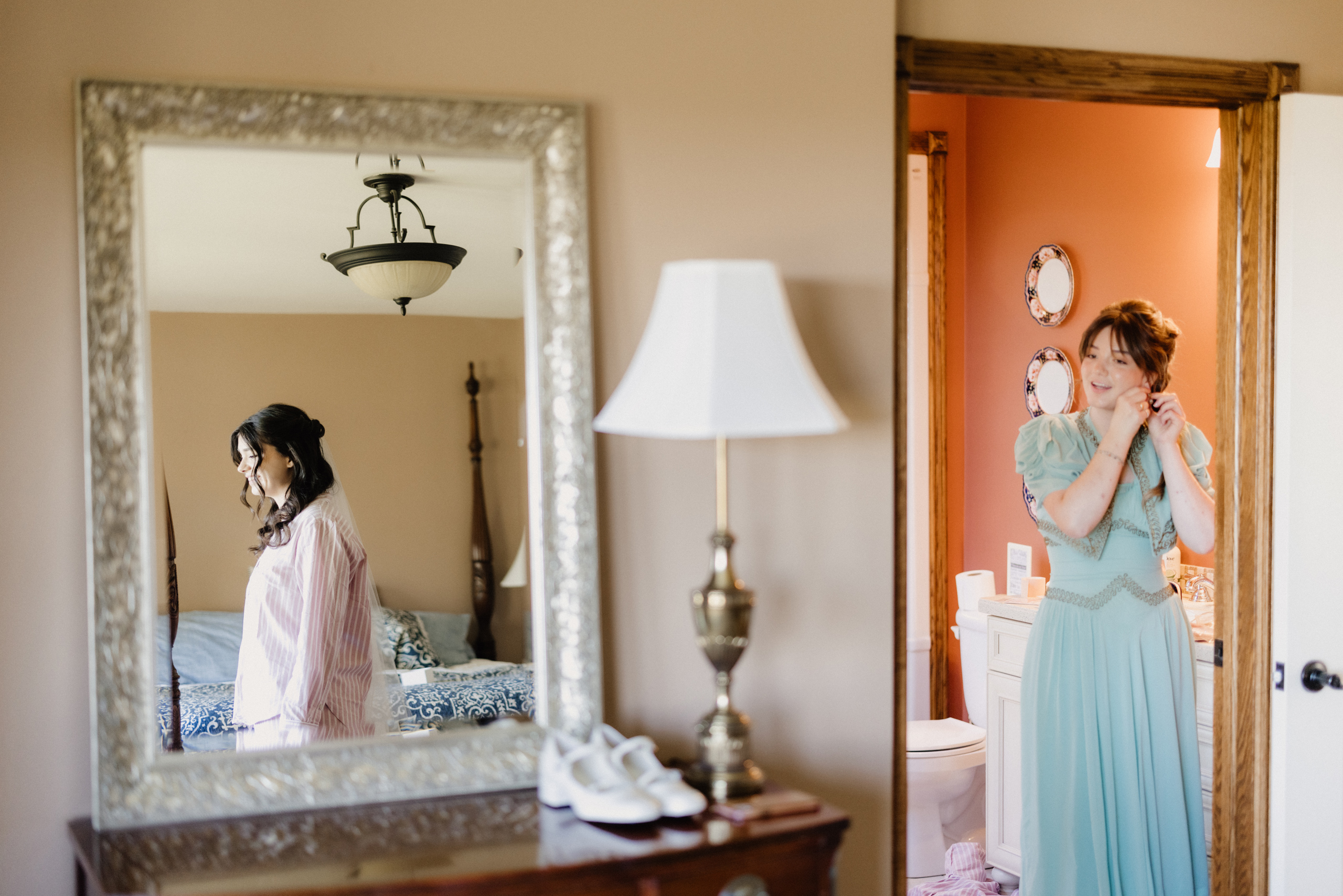 bride and bridesmaid getting ready cave spring estate house autu