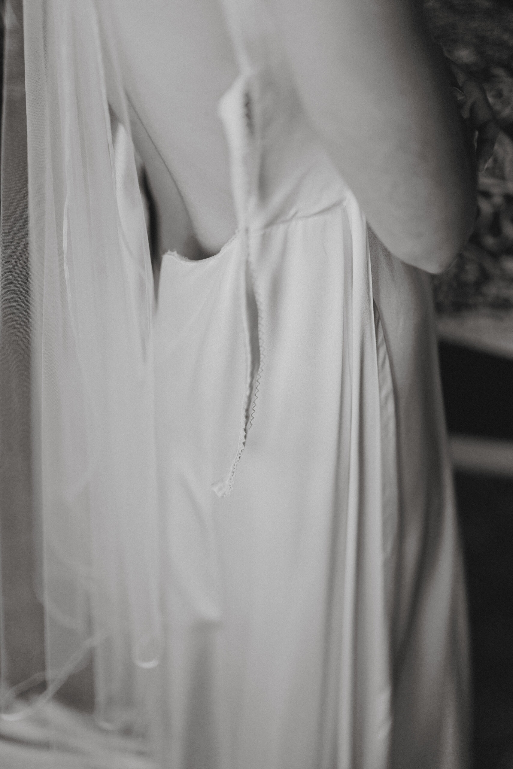 black white film lace wedding dress bride getting ready
