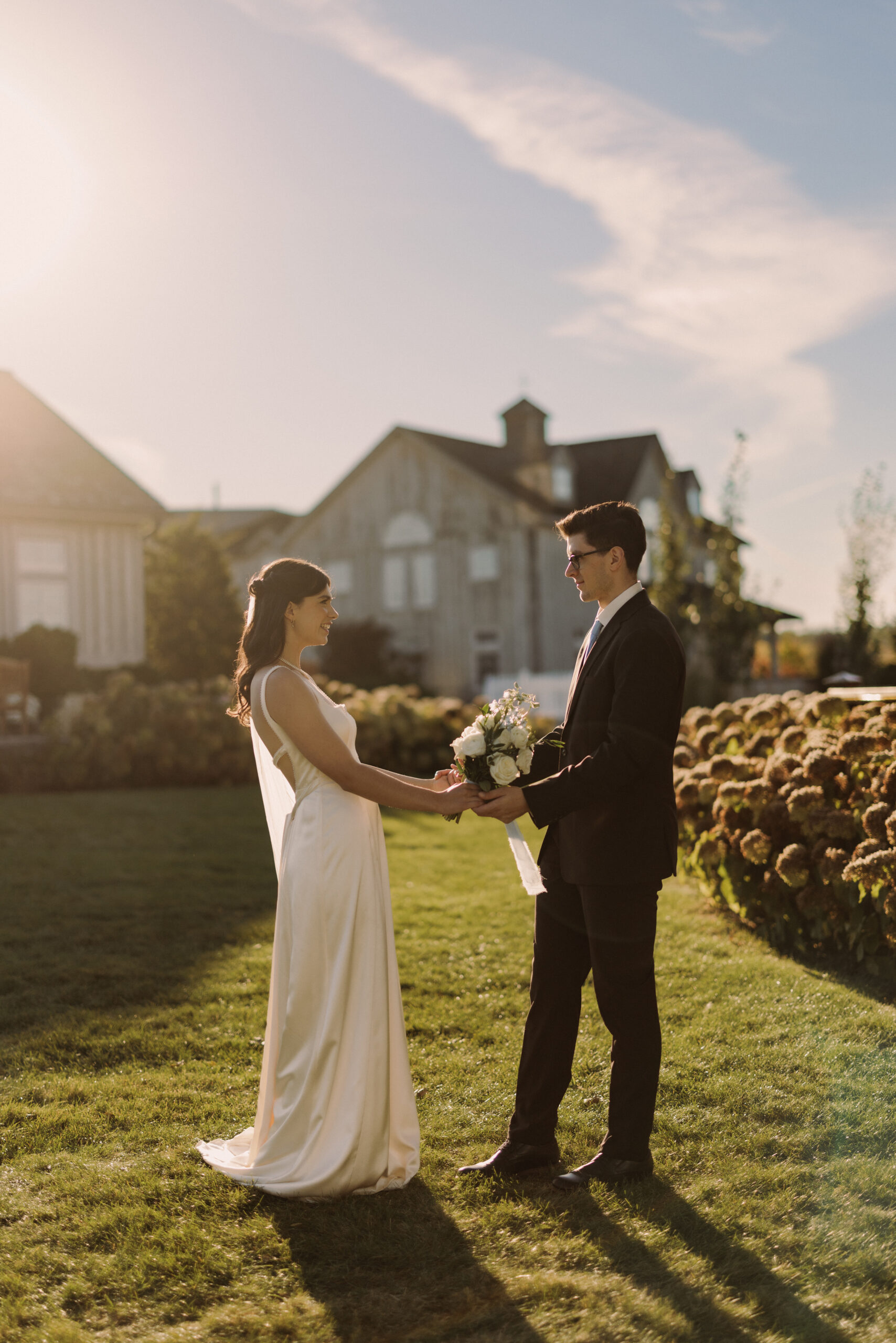 bride groom look at each other candid wedding photography penins
