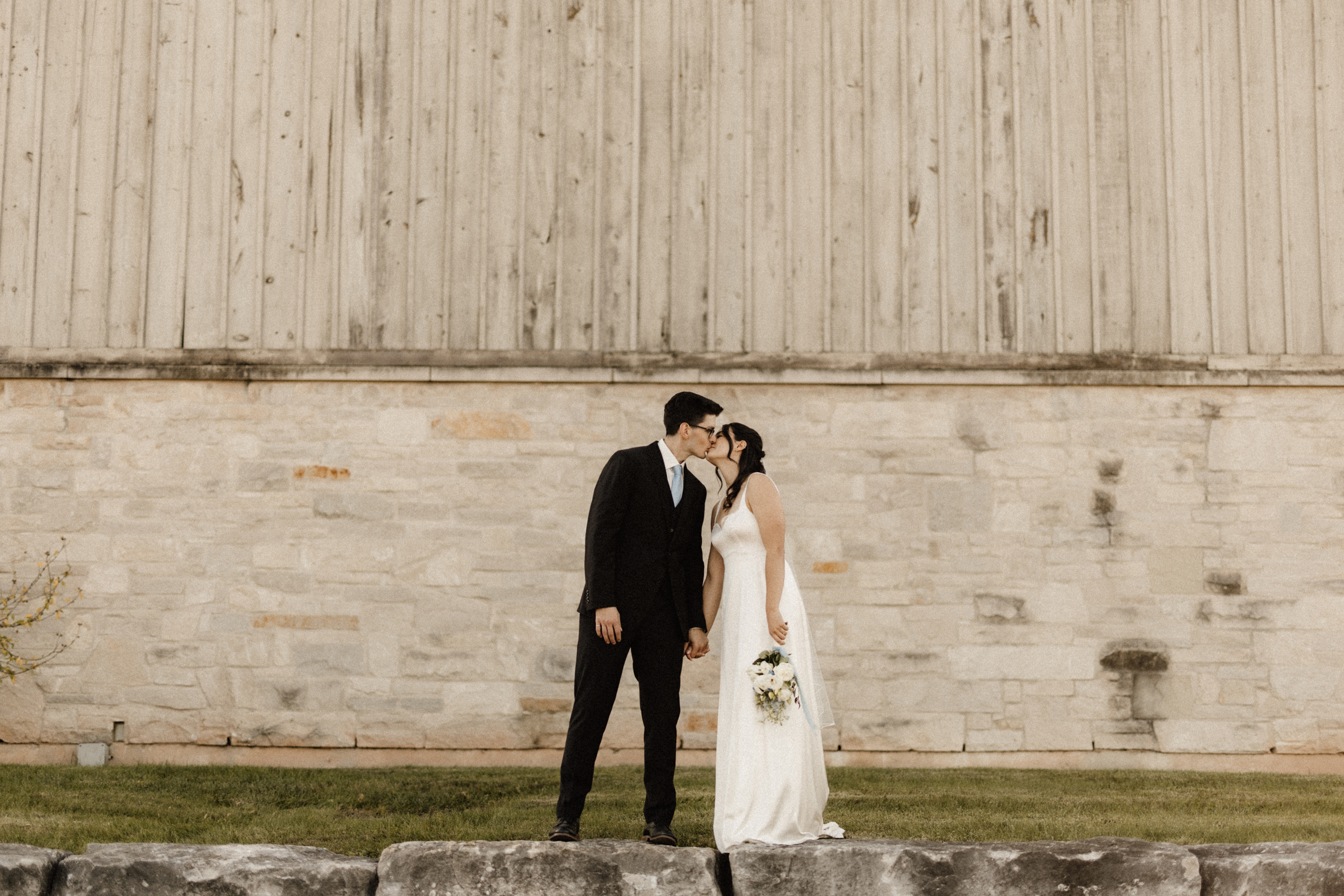 bride groom kiss barn peninsula ridge winery