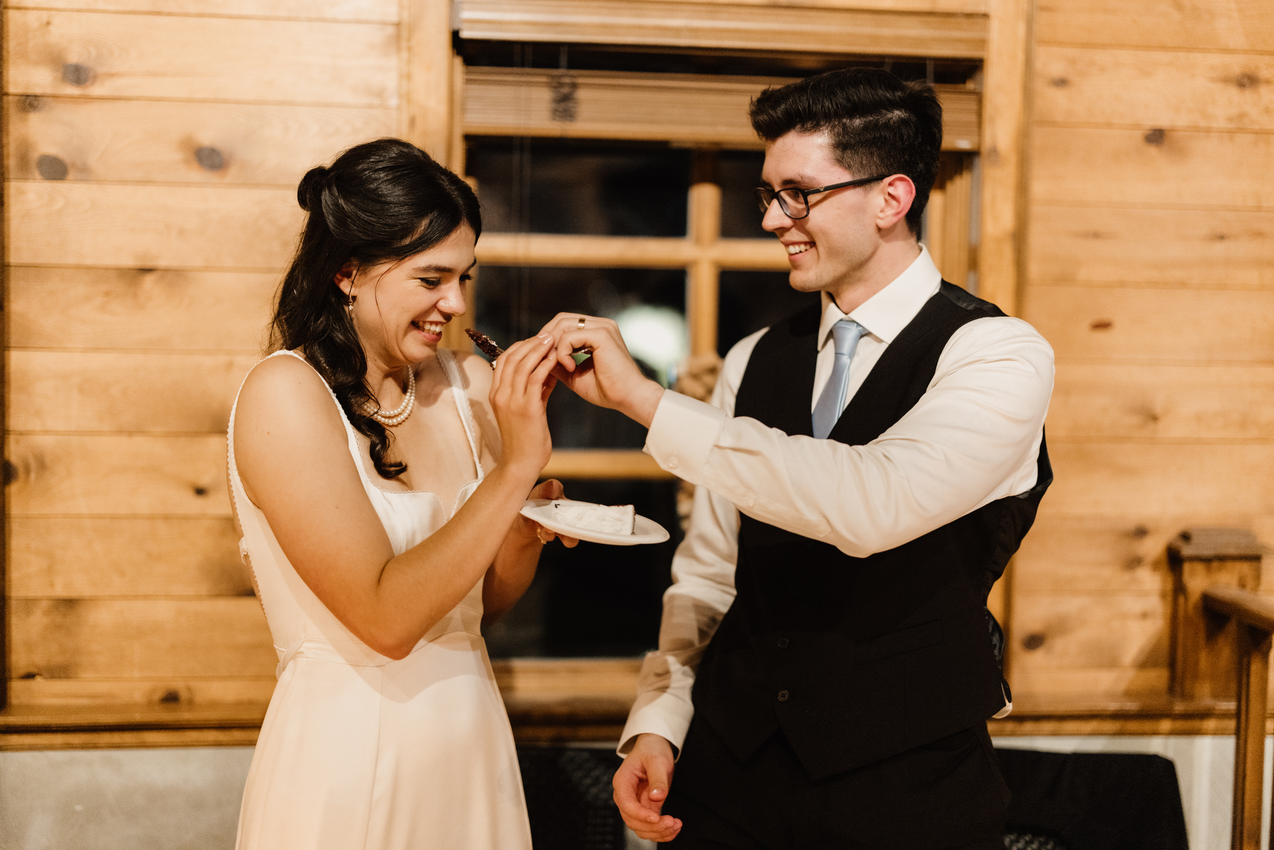 bride groom cut cake peninsula ridge winery wedding reception