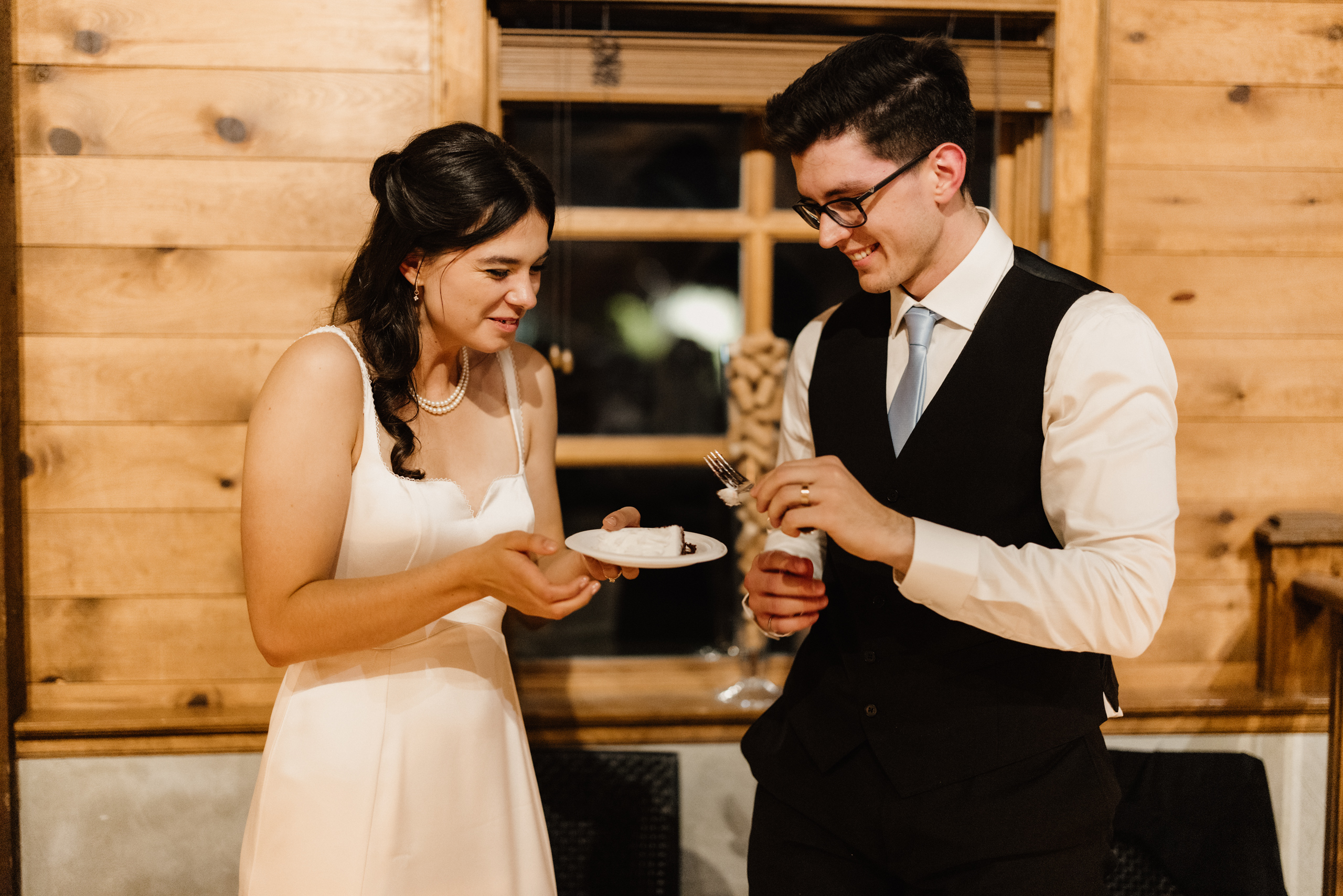 bride groom cut cake peninsula ridge winery wedding reception