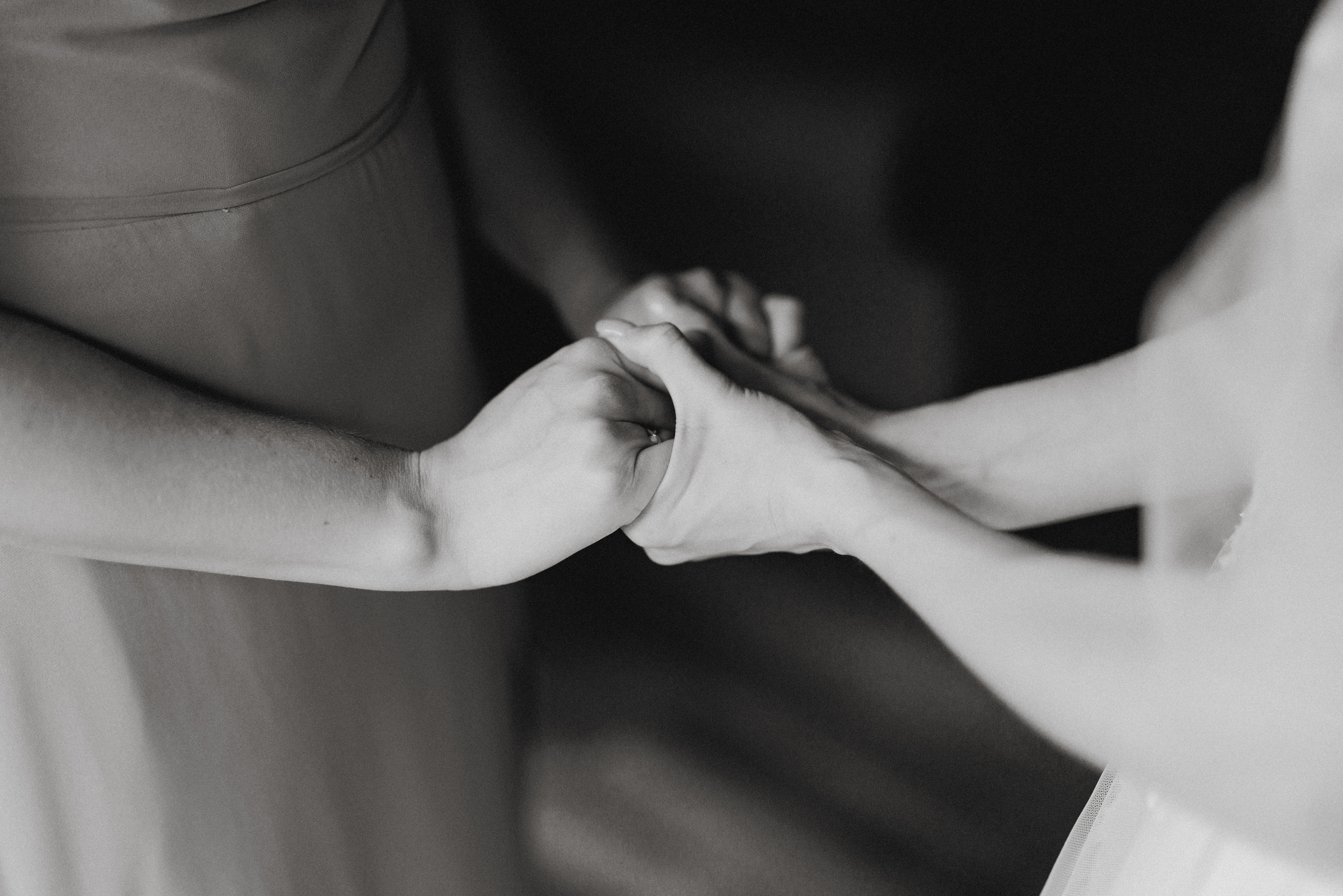 black white holding hands niagara