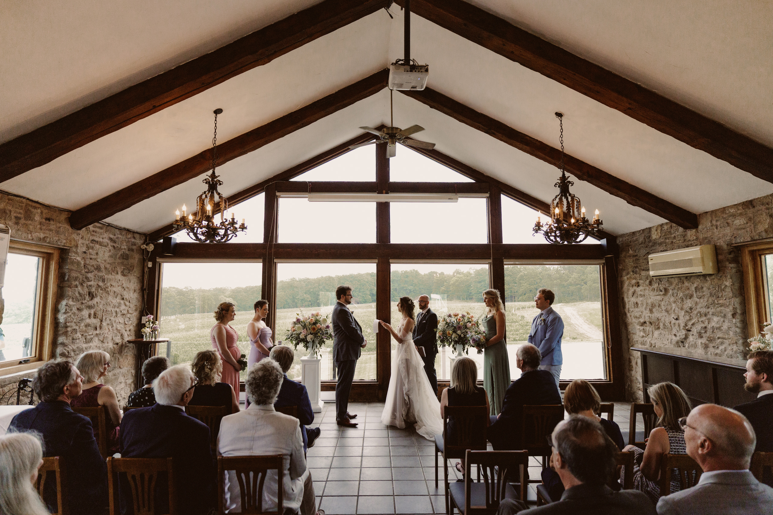 carriage house wedding ceremony interior vineland estates winery