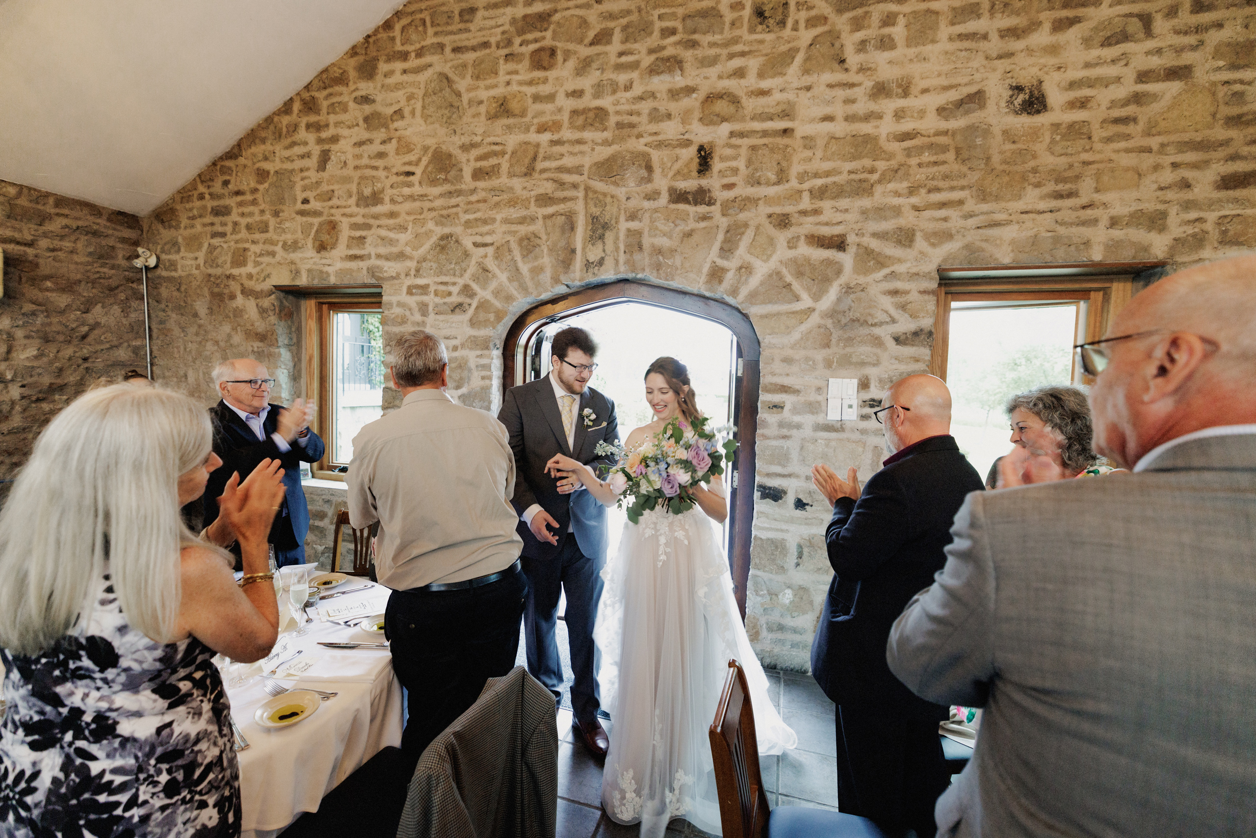 bride groom enter carraige house wedding reception