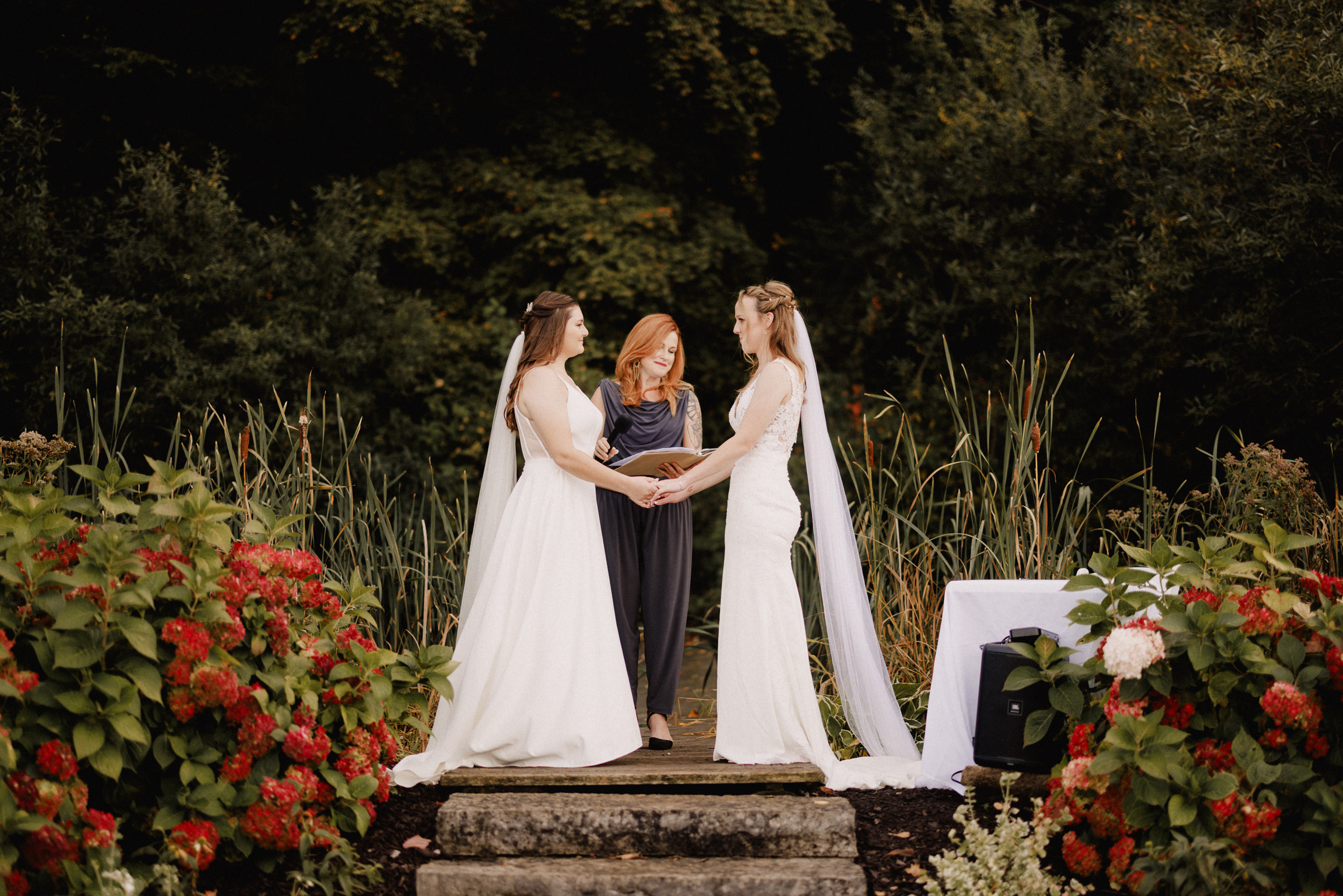 two brides wedding cave spring vineyard escarpment site october