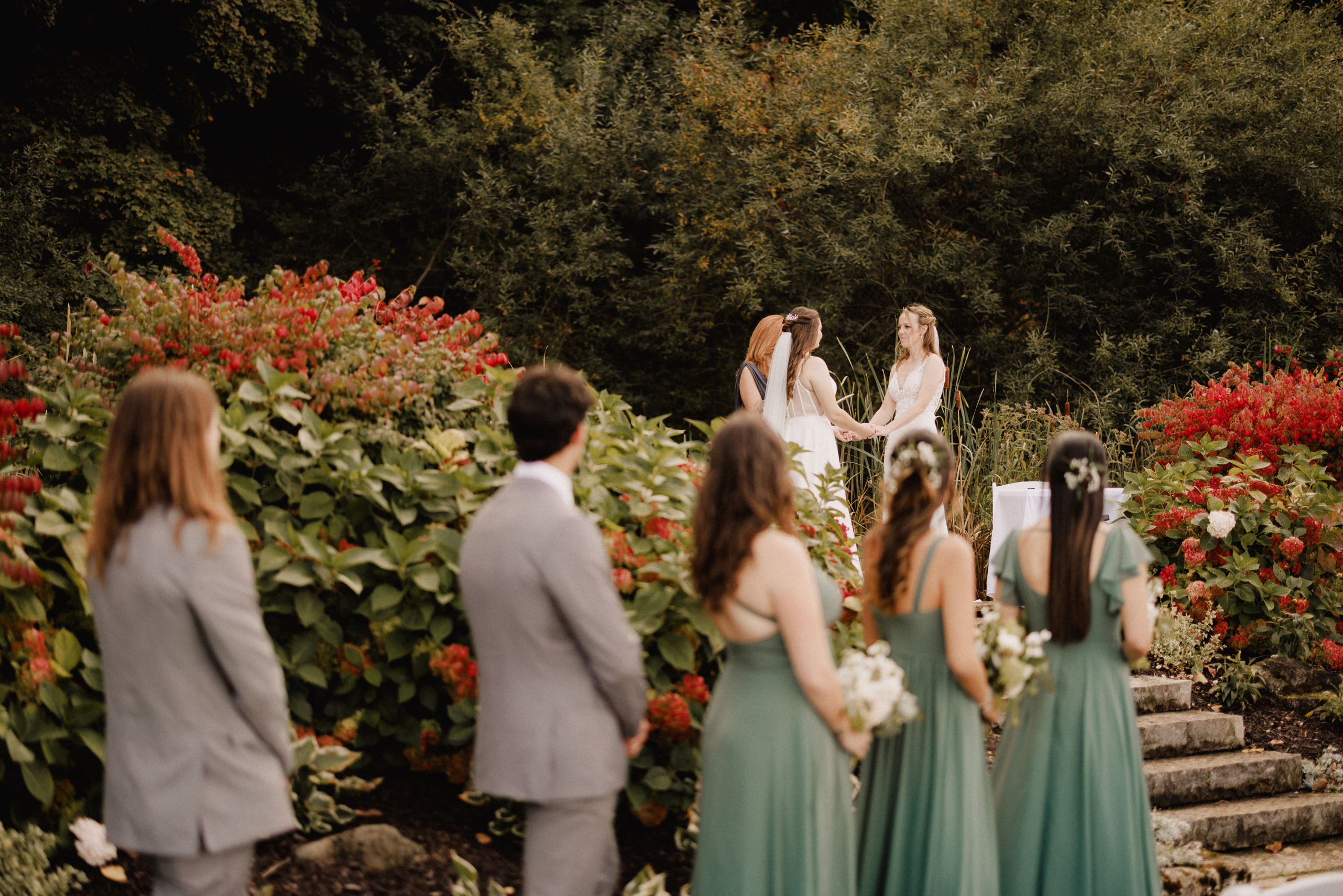two brides wedding cave spring vineyard escarpment site october