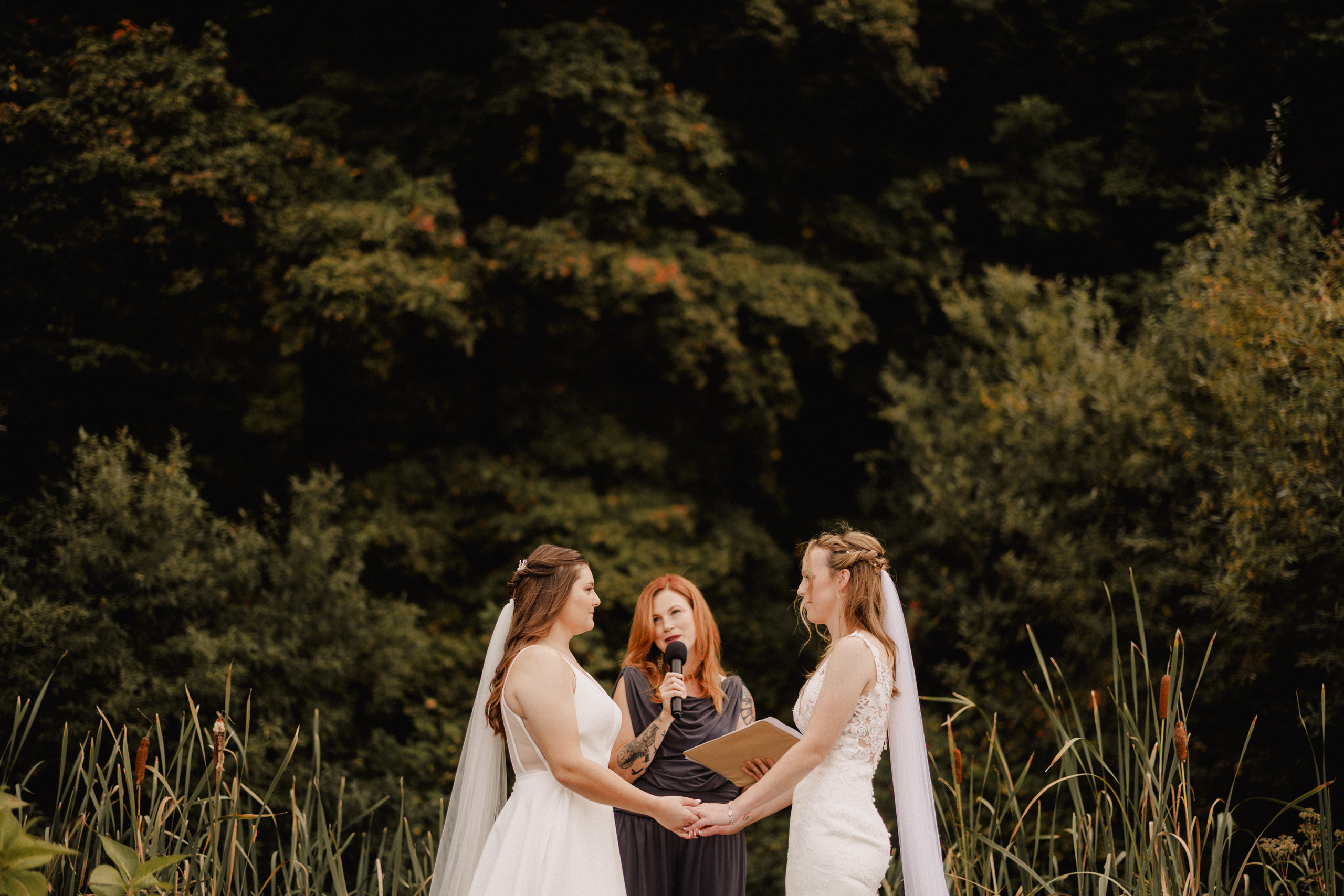 two brides wedding cave spring vineyard escarpment site october
